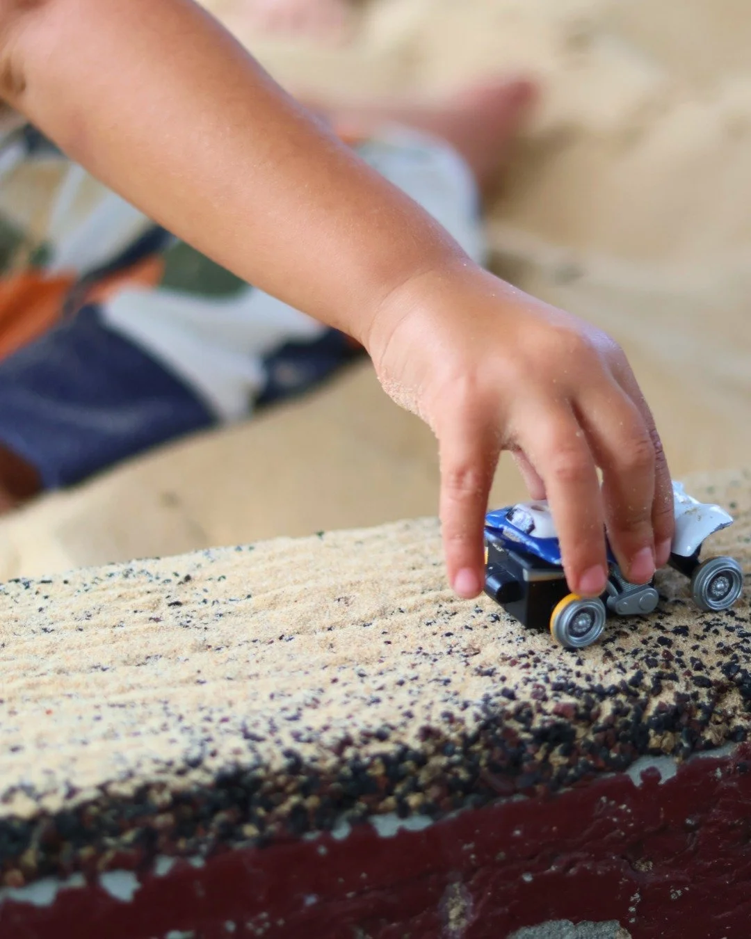 Sandpits are such a valuable resource for play and learning that we have multiple sandpits in our environments for every age group. 

🏖️ Physical Development:
- Fine Motor Skills: Enhances hand and finger muscles.
- Gross Motor Skills: Boosts balanc