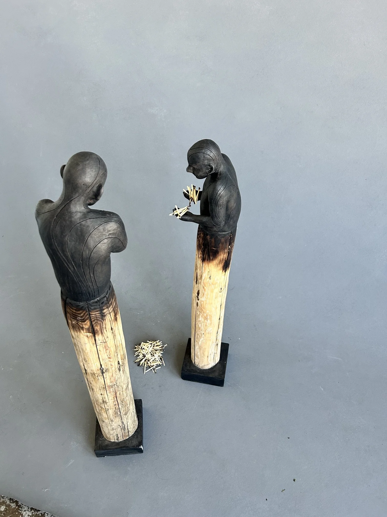 The Matchstick Brothers
2026
Ceramic stained with Sumi ink, Recycled Wood, Concrete, and Burnt Matchsticks
H50" x W7" x D6"