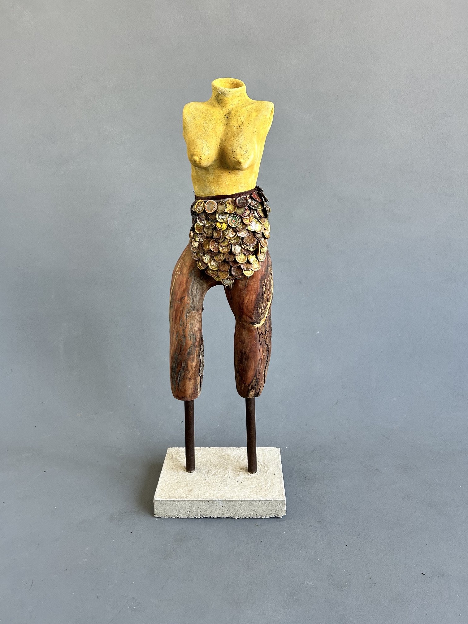 Turmeric Sunset
2026
Turmeric-stained Ceramic, Driftwood, and Bottlecaps (with a concrete and steel base)
H40" x W11" x D7"