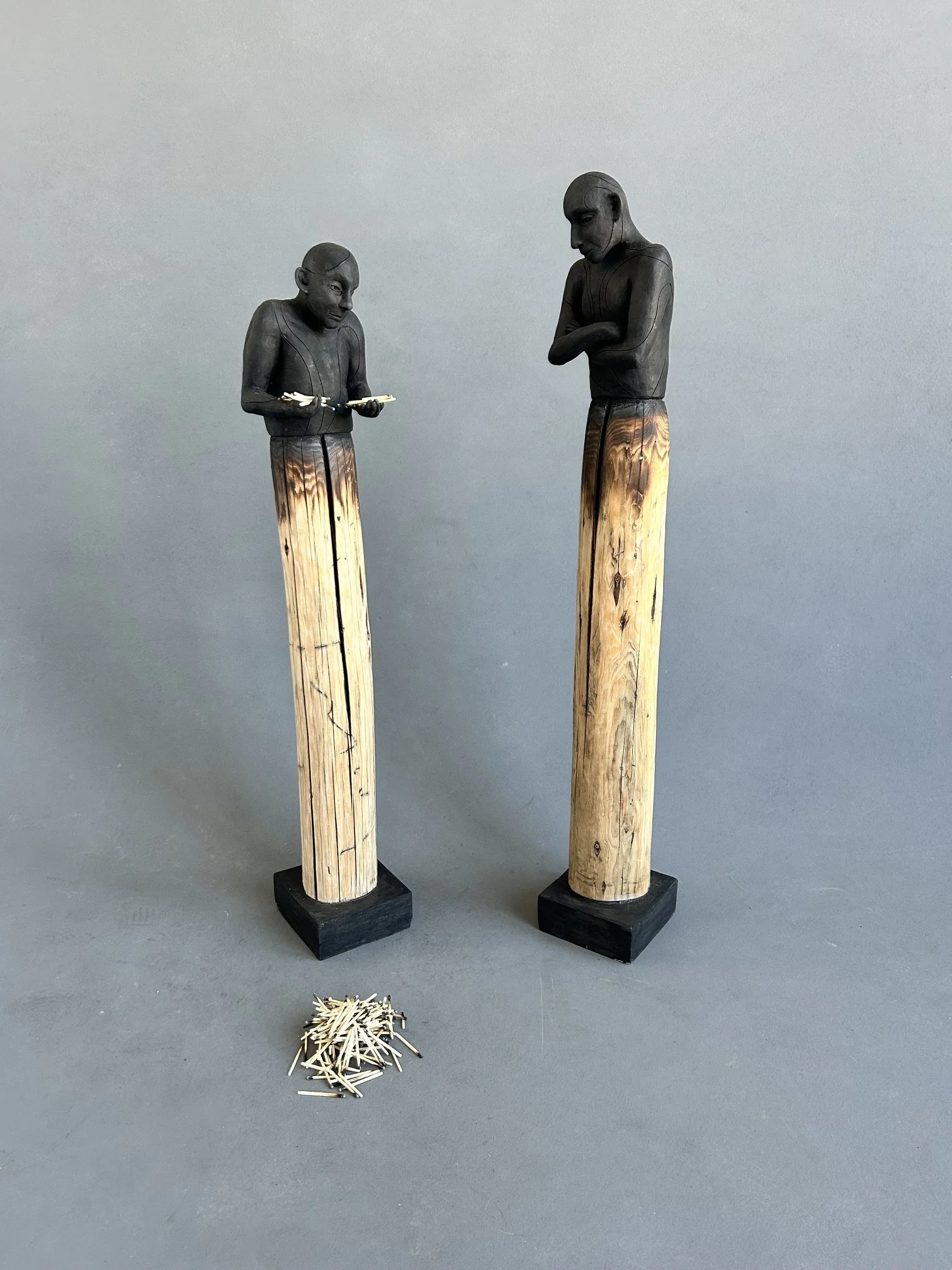 The Matchstick Brothers
2026
Ceramic stained with Sumi ink, Recycled Wood, Concrete, and Burnt Matchsticks
H50" x W7" x D6"