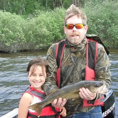 Doug and MJ with walleye.jpg