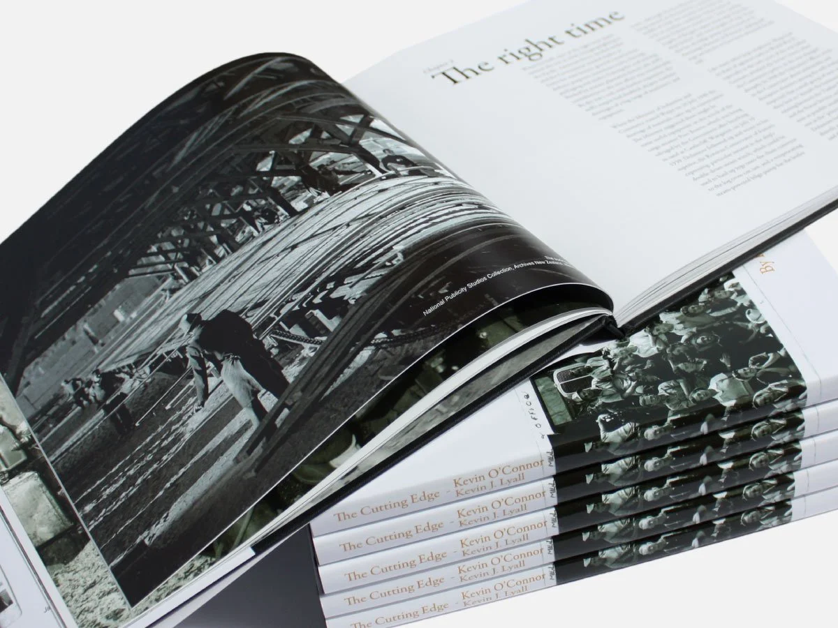 Case-bound history book design and print production with premium finishing specifications for Red Stag.