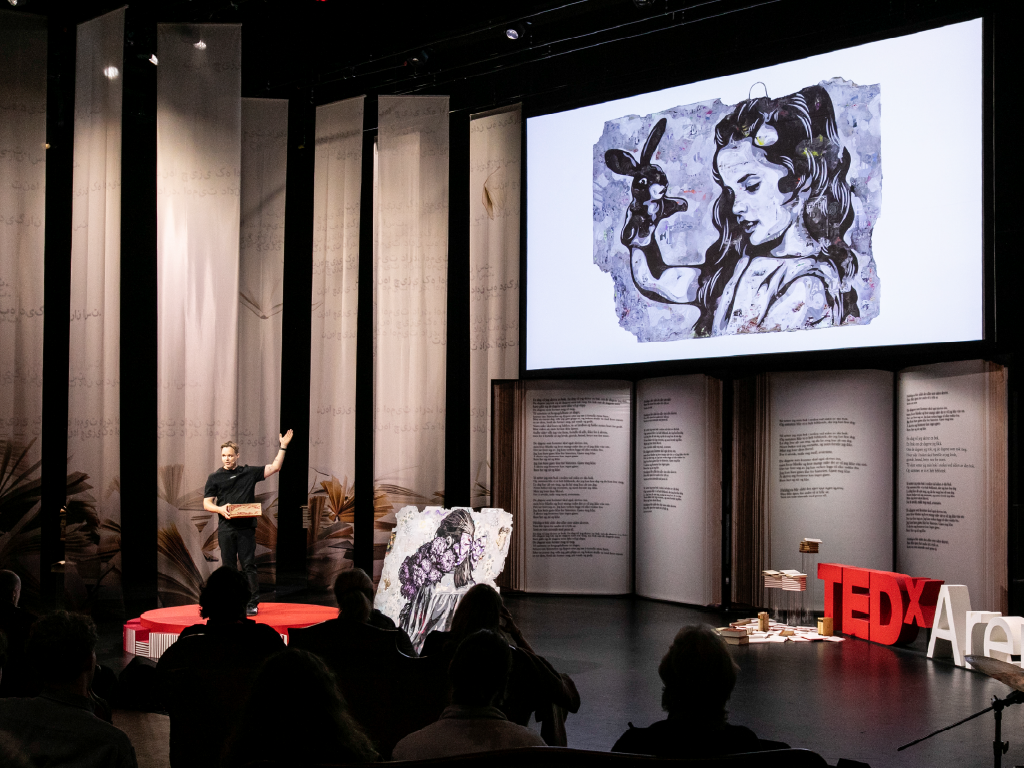 René Konings. Speaker on stage, TEDxArendal 2025.