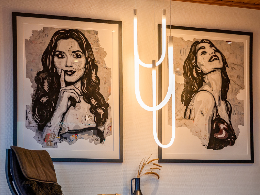 Framed hand‑embellished versions of 'Mileva' and 'Ursula' in situ.