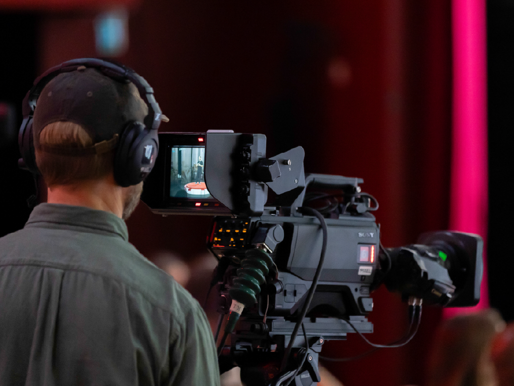 René Konings. Speaker on stage, TEDxArendal 2025.