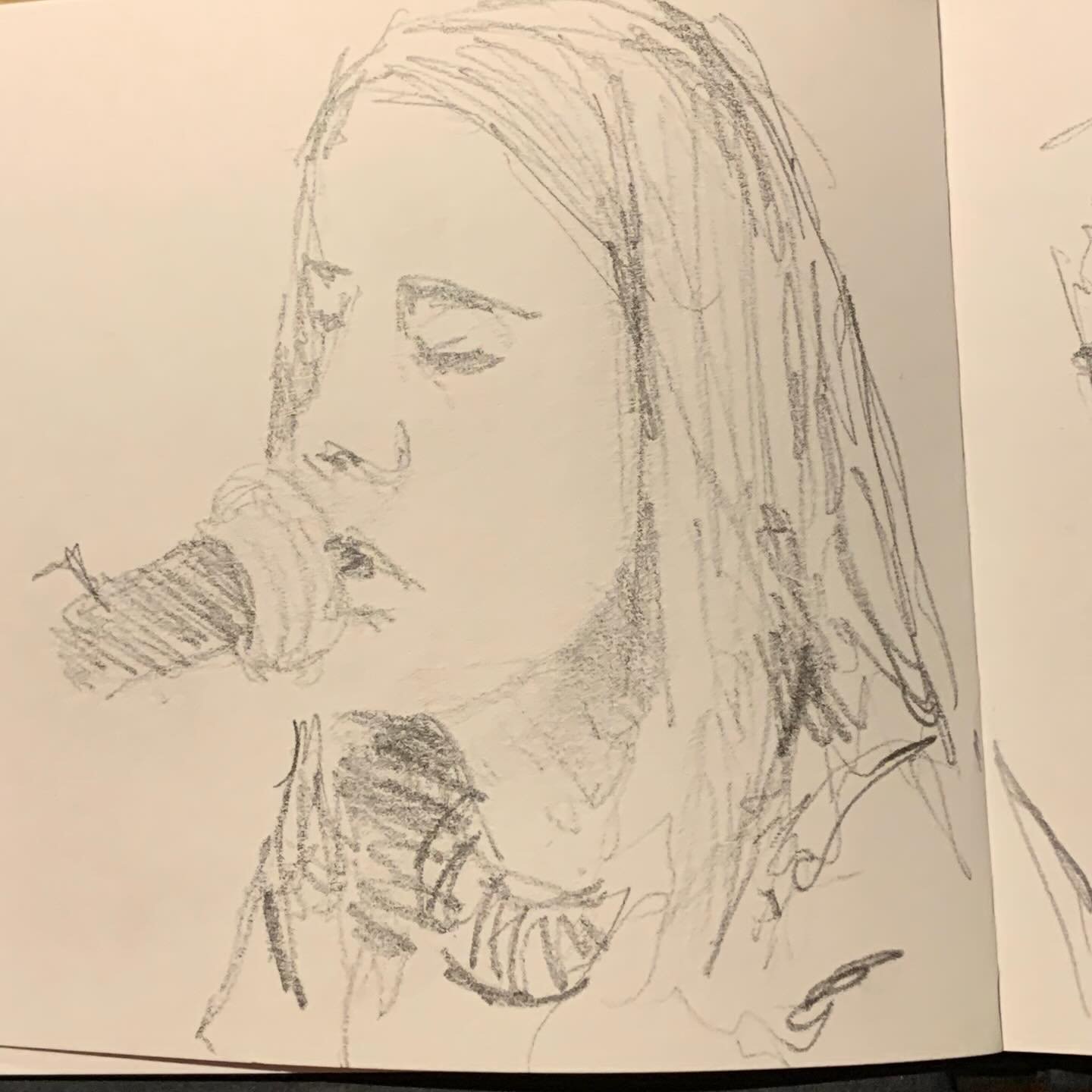 Listening to live music from Lleucu Gwawr. Gwrando i cerddoriaeth o @lleucugwawr. Gwych. @nant_gwrtheyrn #dysgucymraeg #cerddoriaeth #livemusic #sketching.