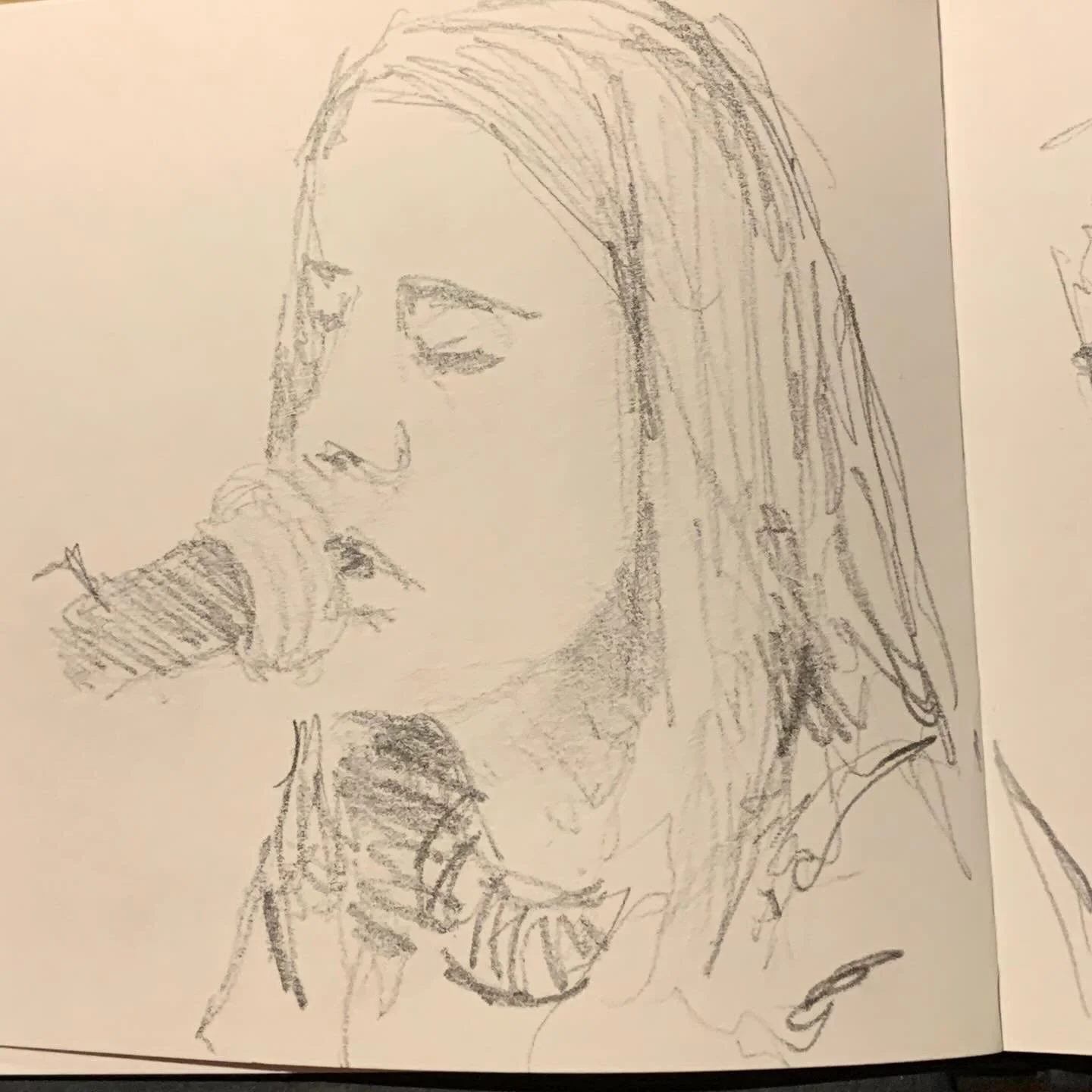 Listening to live music from Lleucu Gwawr. Gwrando i cerddoriaeth o @lleucugwawr. Gwych. @nant_gwrtheyrn #dysgucymraeg #cerddoriaeth #livemusic #sketching.