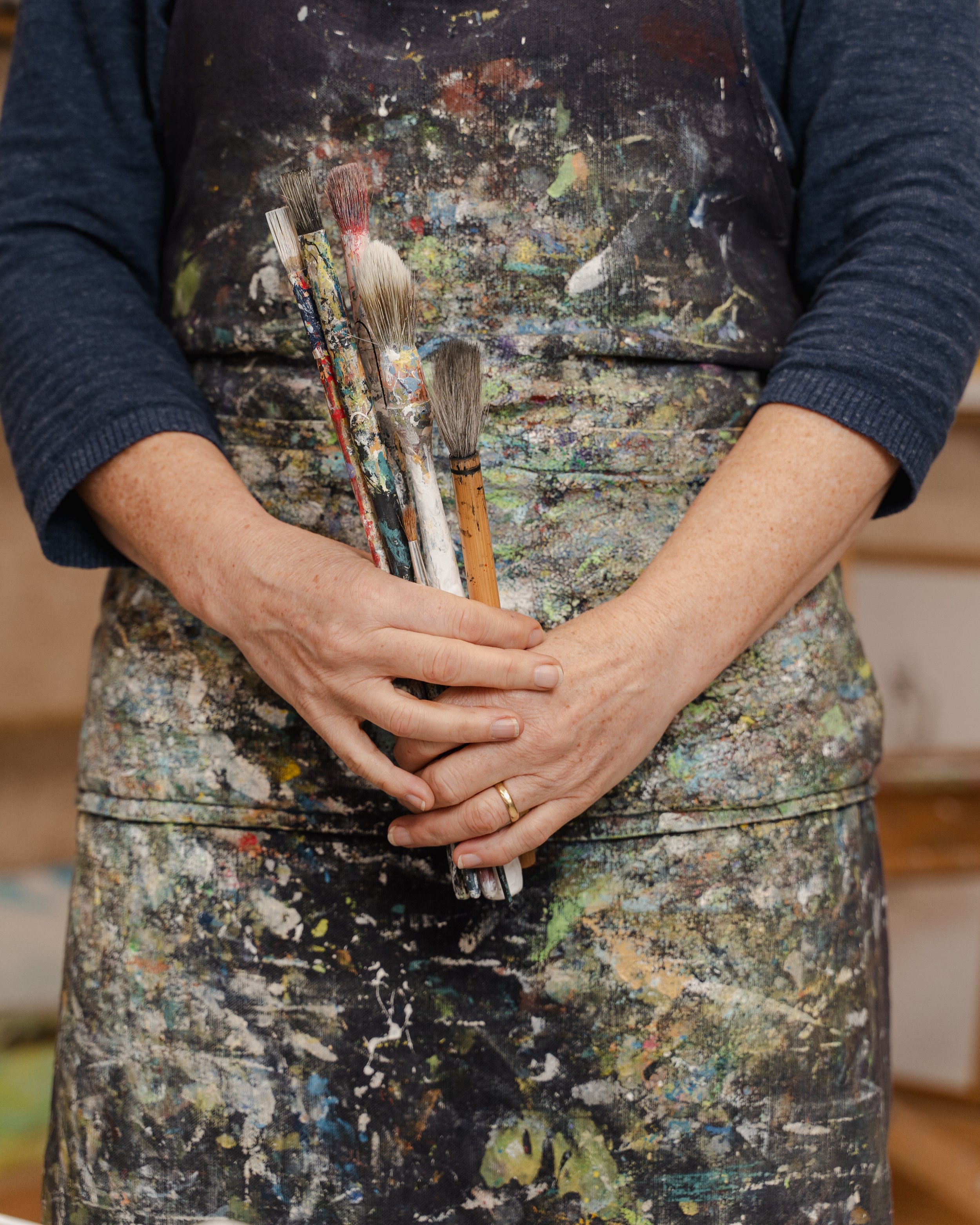 Brushes held in hands, Emma-Jayne Holmes
