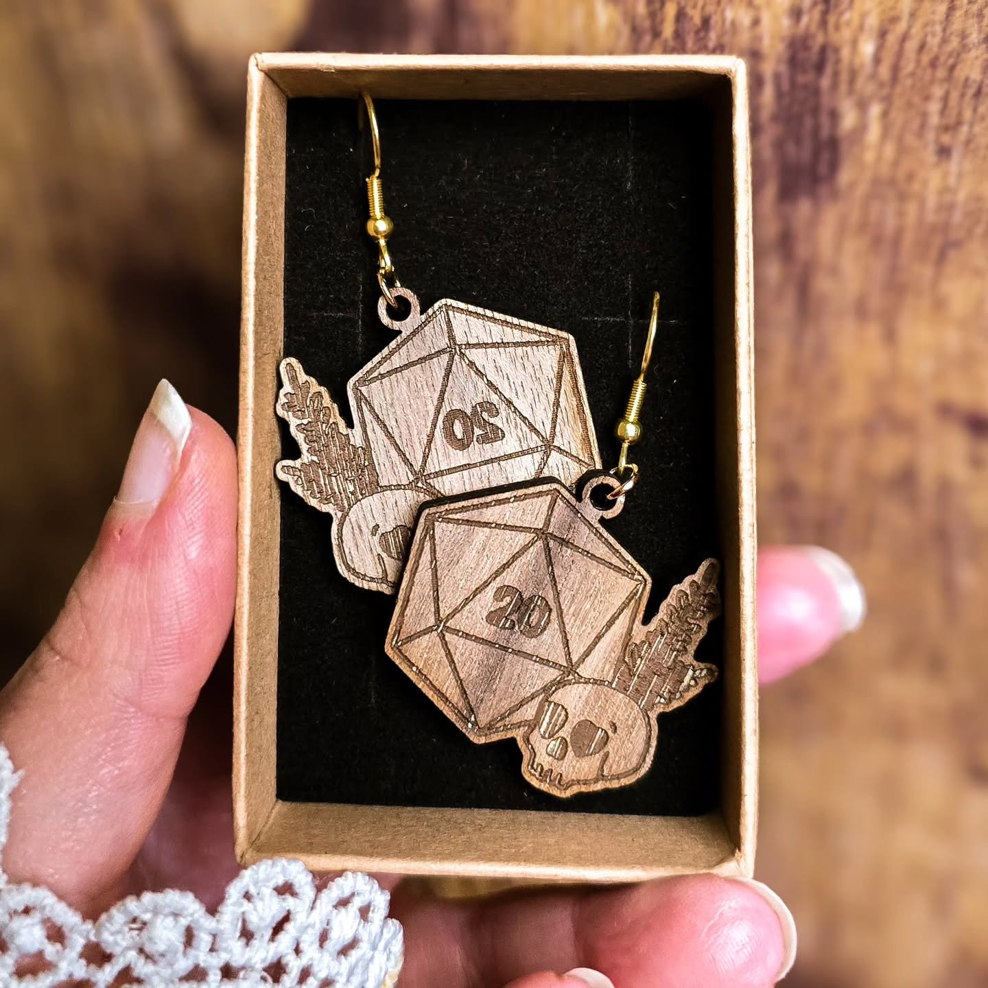 Our new collection is fully Handmade by our Head Witch, from start to finish.

Made using high quality walnut wood, our new collection features new earrings, necklaces, pin badges, treasure boxes, wall decor, keychains and more to come...

We are sti