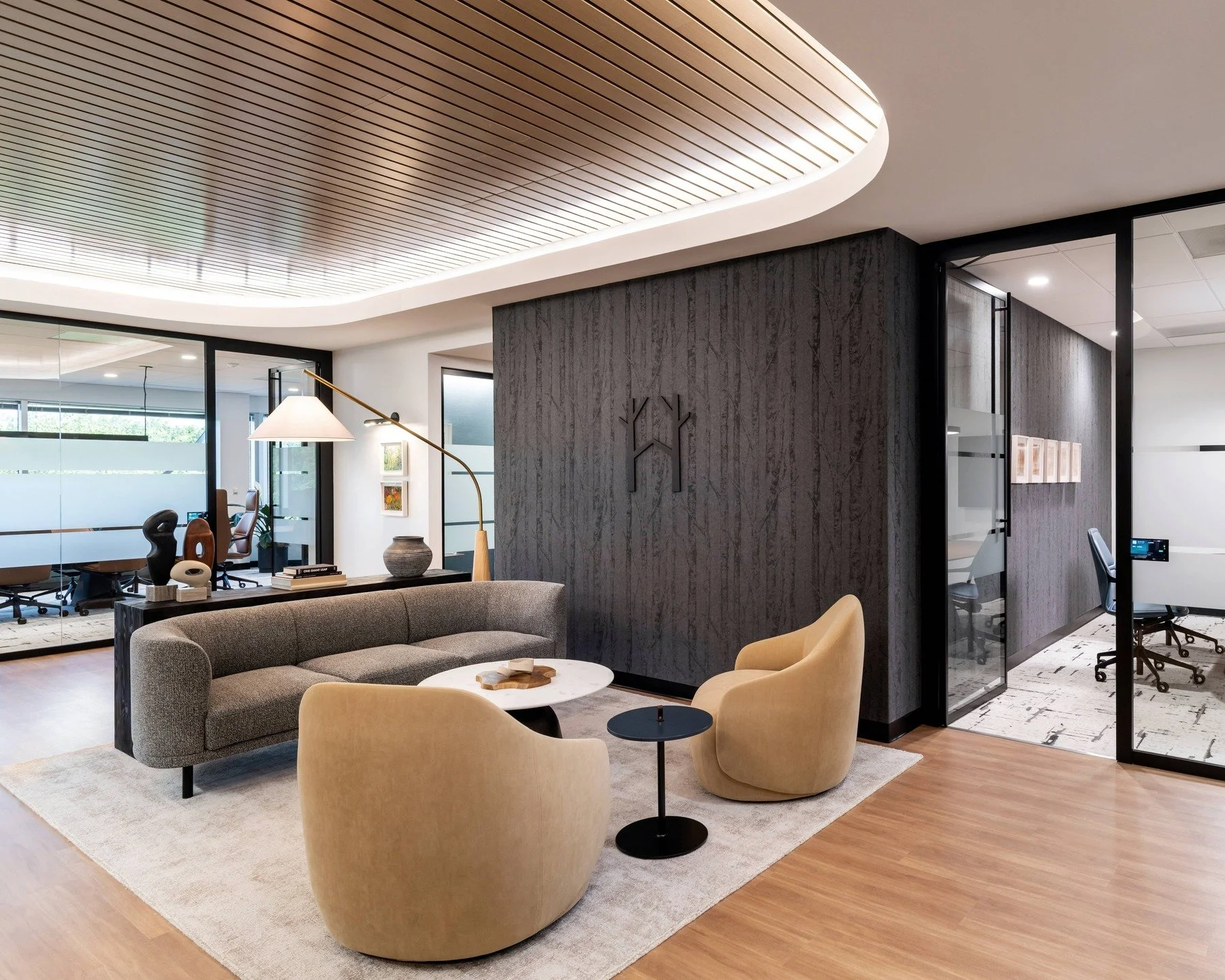 Heartwood Wealth Advisors sought a refined space that reflects their brand and enhances the client experience. The newly renovated suite balances a warm, polished aesthetic with improved workflow, supporting growth, marketability, and meaningful conn