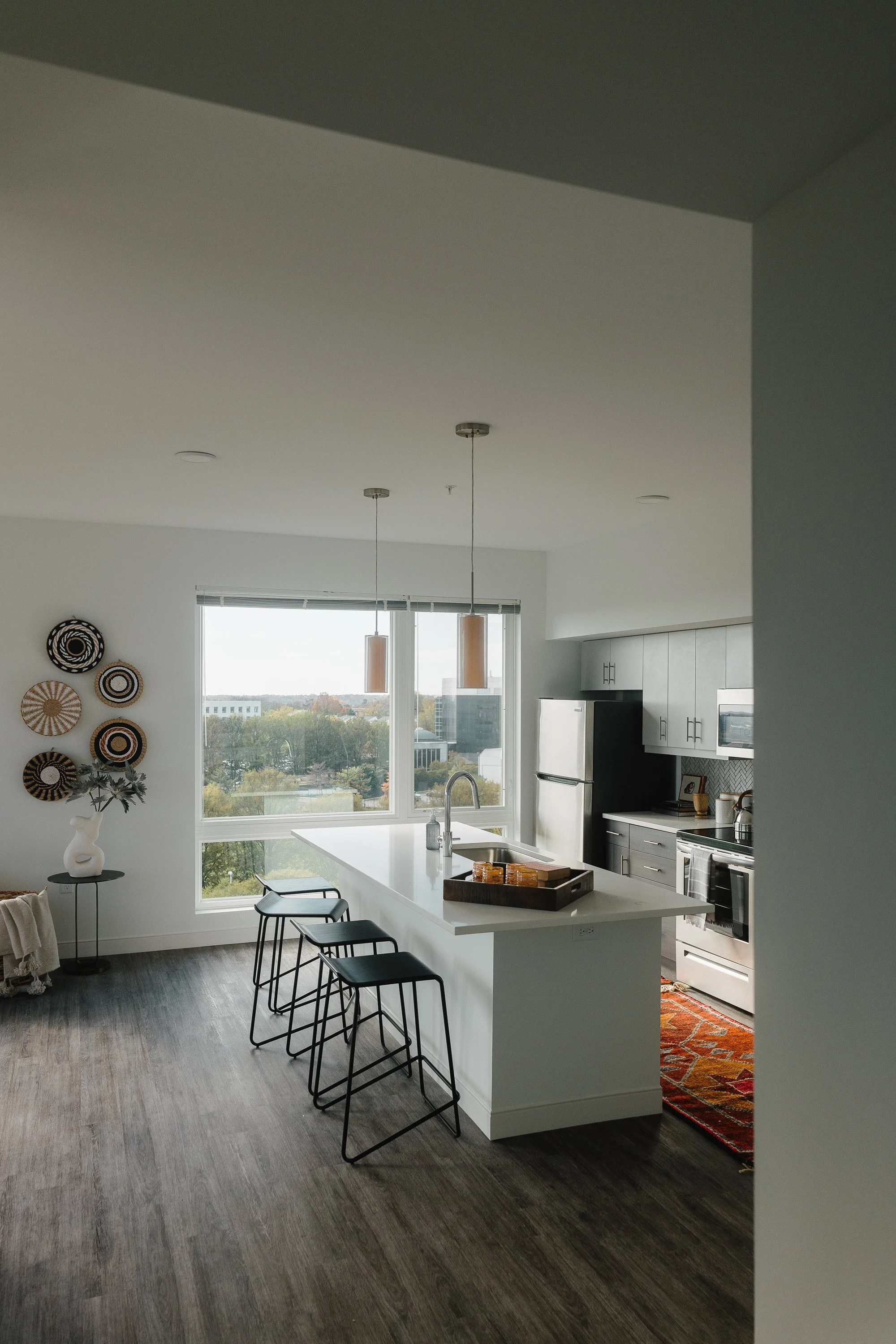 Interior shot of unit kitchen in SMBW mixed-use development One Canal on the corner of First and Canal in the Monroe Ward neighborhood