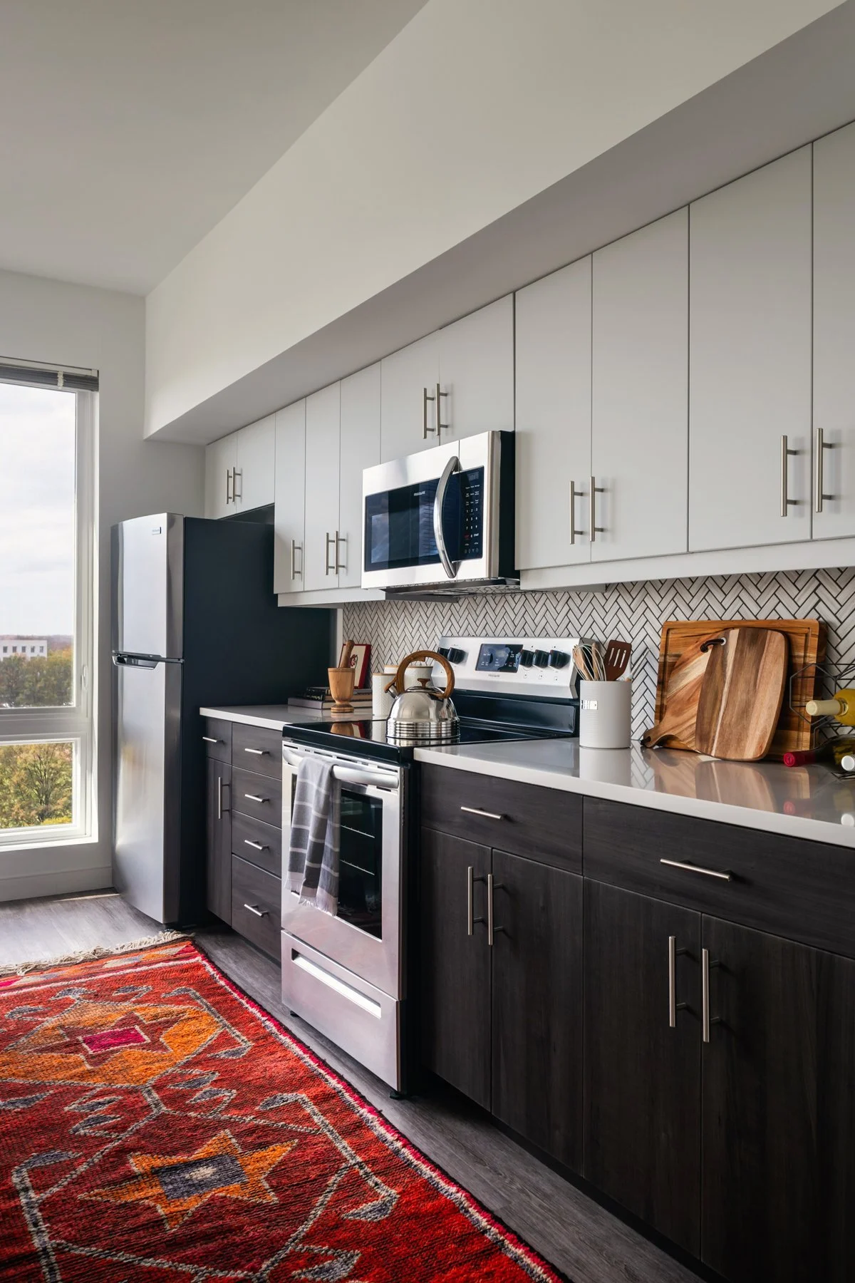 Interior shot of unit kitchen in SMBW mixed-use development One Canal on the corner of First and Canal in the Monroe Ward neighborhood