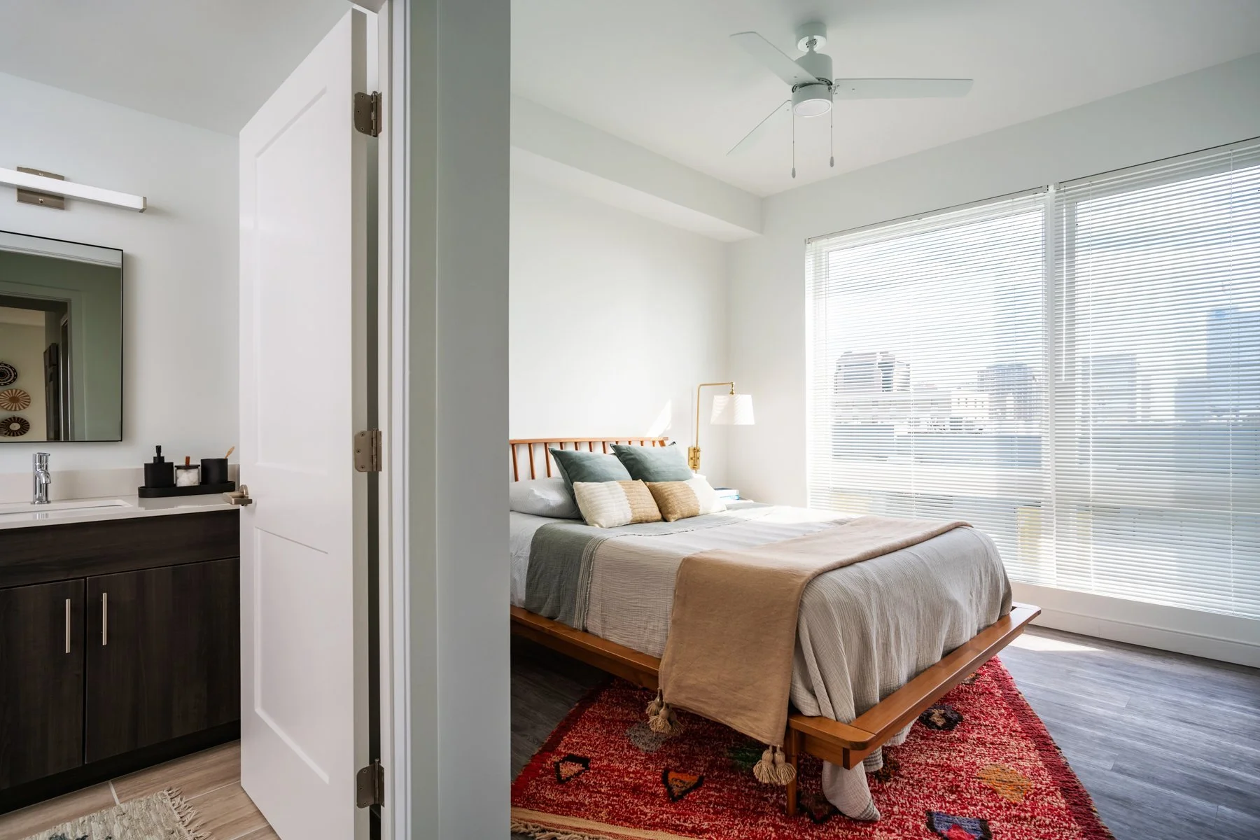 Interior shot of unit bedroom and bath in SMBW mixed-use development One Canal on the corner of First and Canal in the Monroe Ward neighborhood