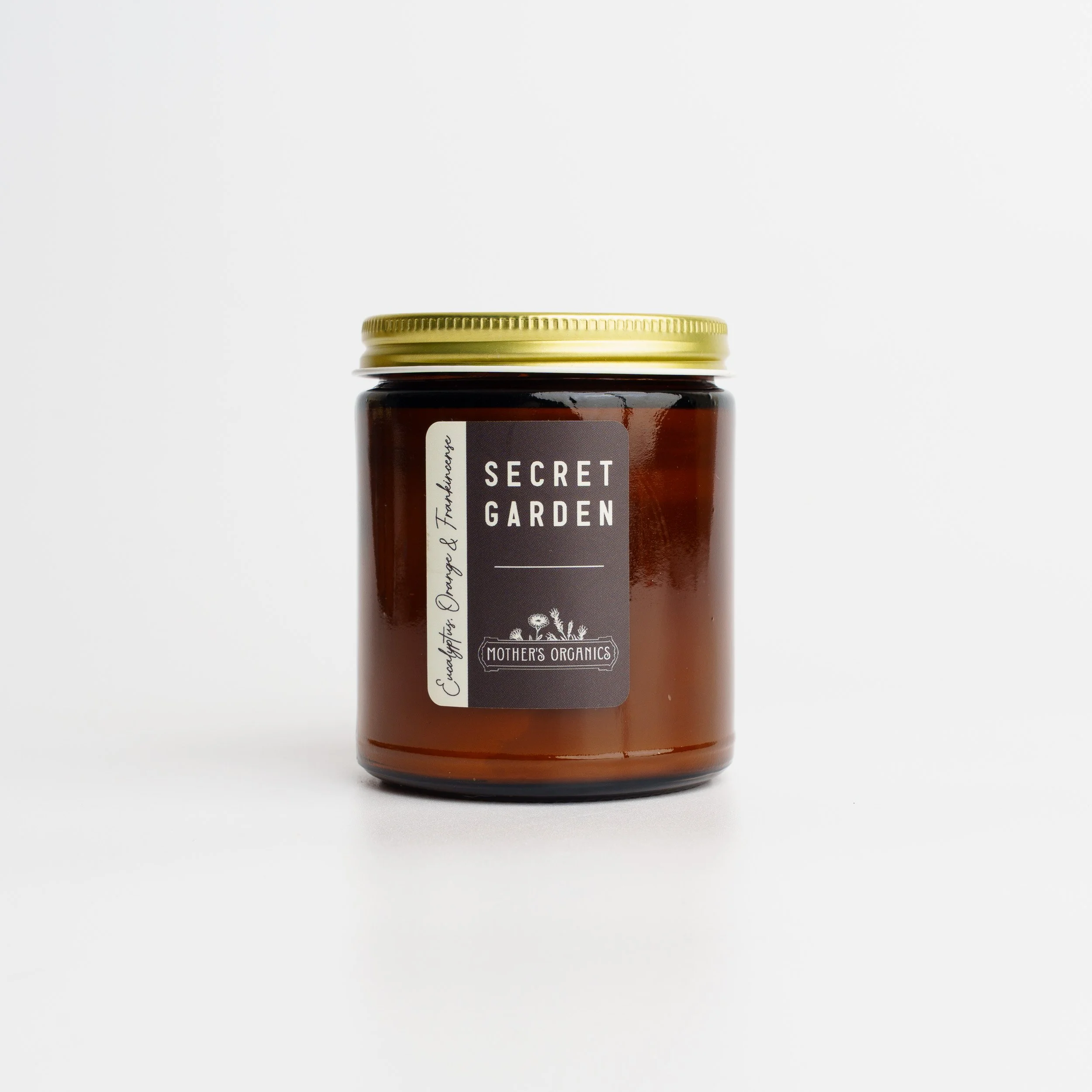 mothers-organics-secret-garden-candle-9oz-hero-01.jpg