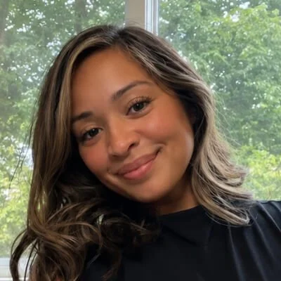 Christina Torres is a woman with brown highlighted hair