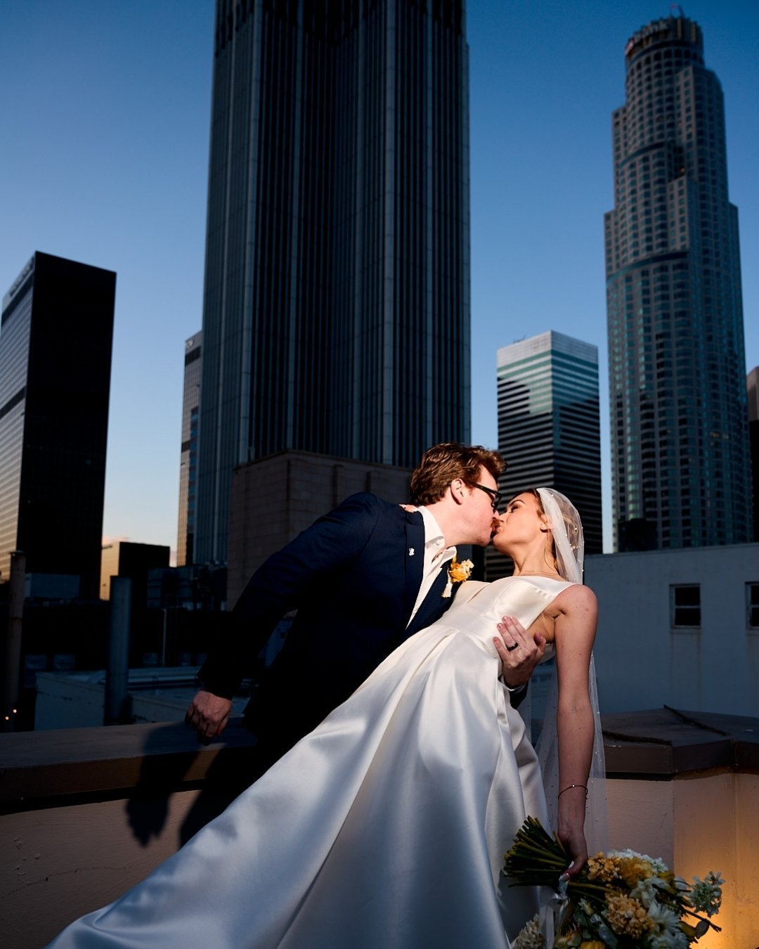 Capturing a timeless moment against the dazzling lights of downtown LA, Erin and Evan's love shines brightly at The Oviatt. Let our historic venue be the stunning backdrop for your own love story. 💖 #LoveInTheCity #TheOviattLA #UrbanRomance

Photogr