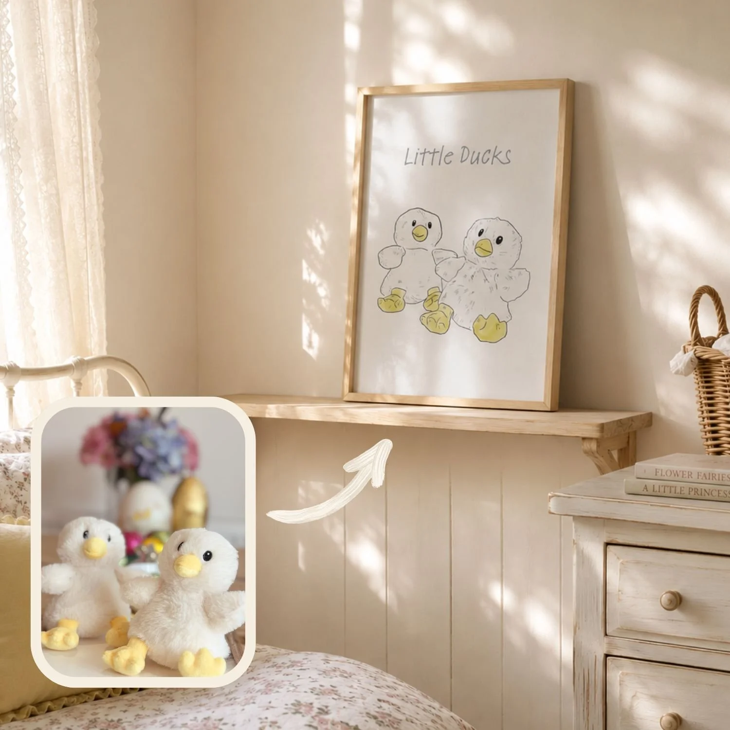 Room with white walls, featuring a wooden shelf, a framed drawing of two plush duck toys labeled 'Little Ducks', and a small white wooden nightstand with books and a wicker basket on top. Plush duck toys with yellow beaks and feet are on a floral-pat