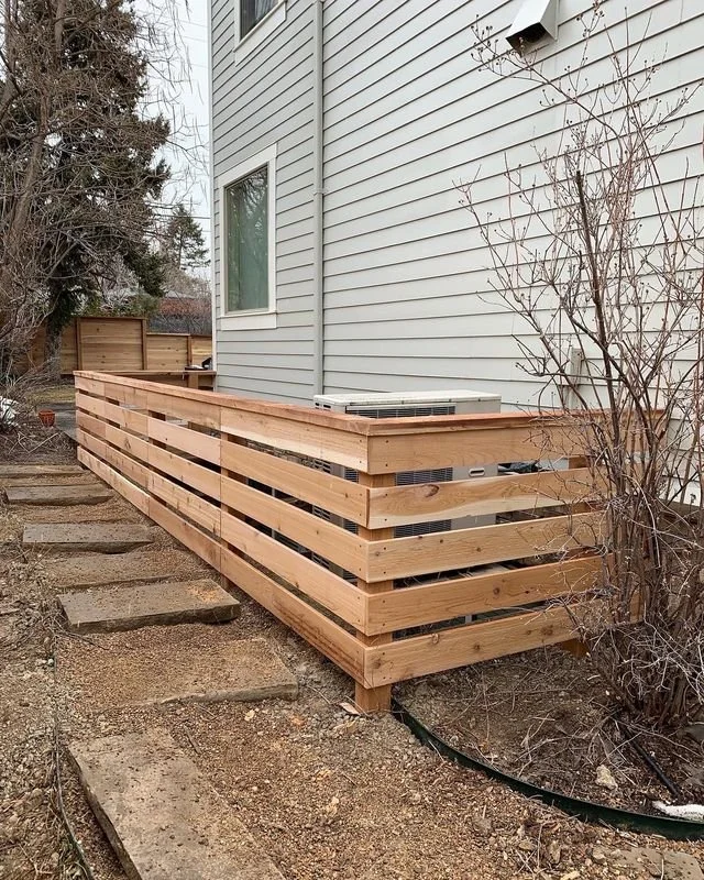 fence with sir conidtioner.jpeg