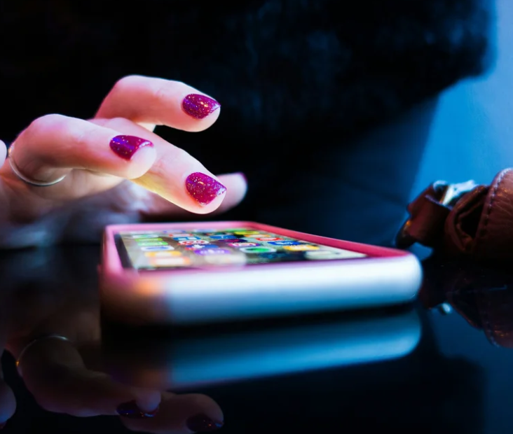 A person scrolling on their phone
