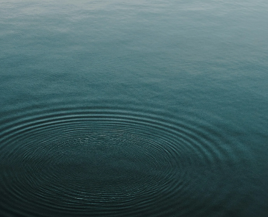 Blue water with a capillary wave.