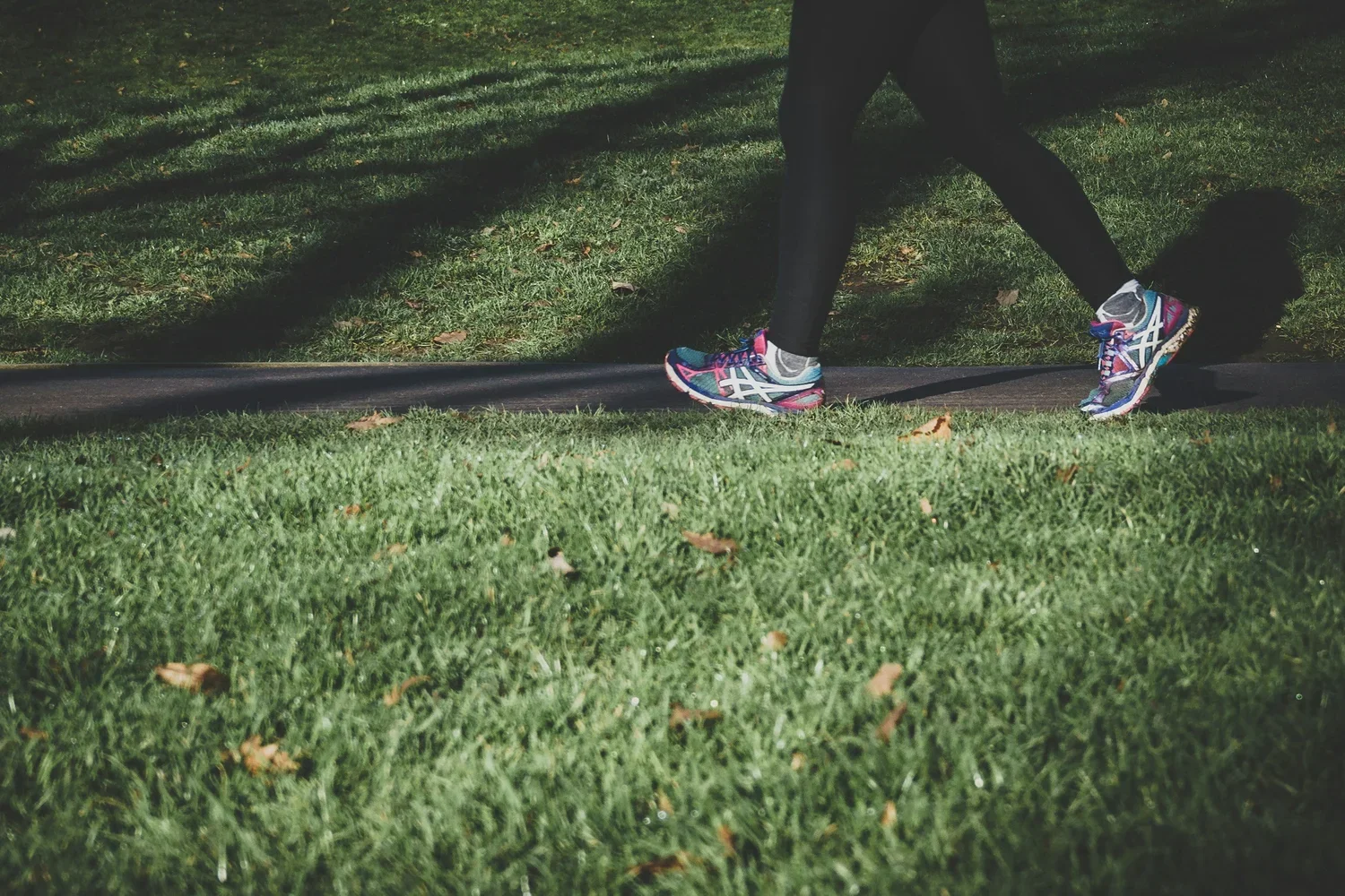a person walking on grass
