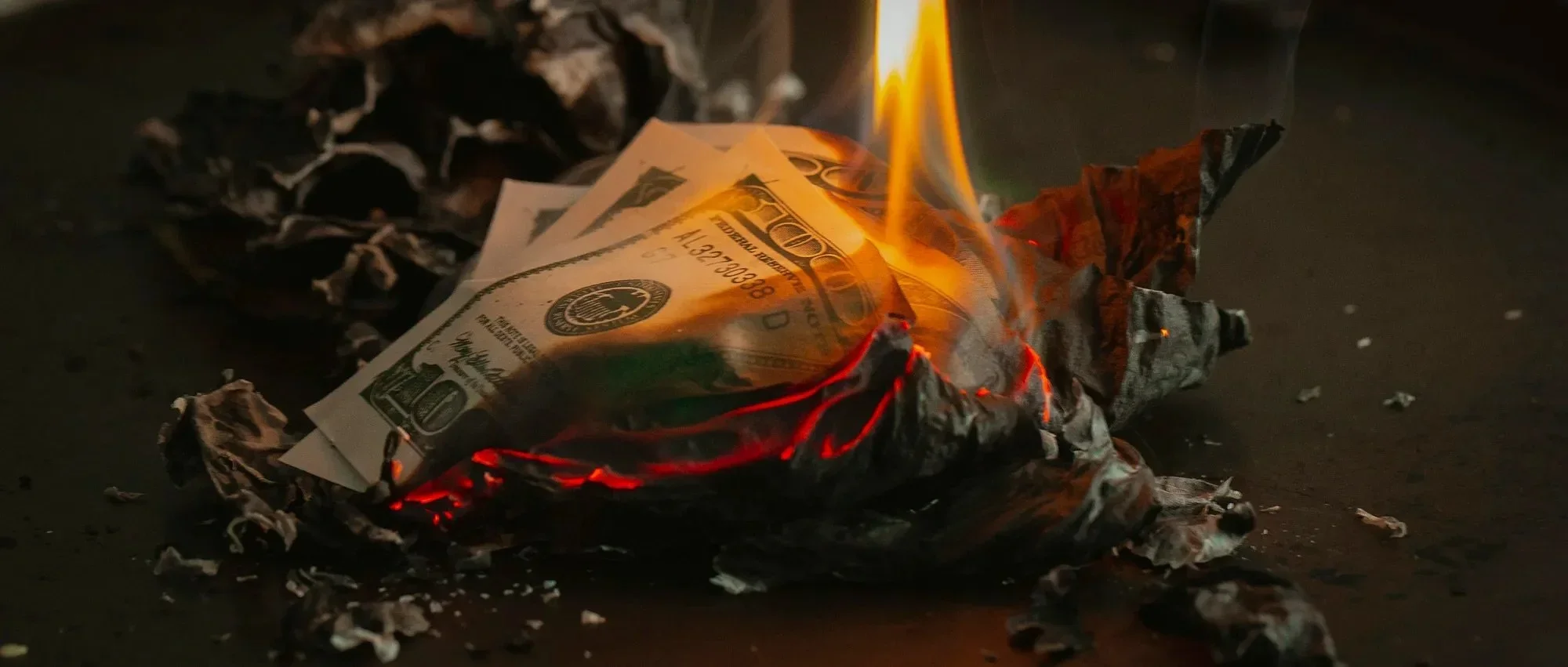 a lot of money on fire