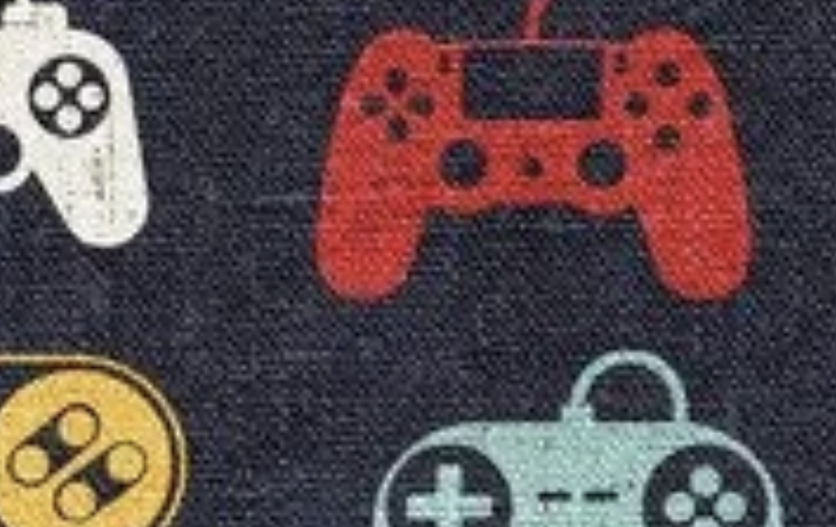 Red video Game controller on fabric.