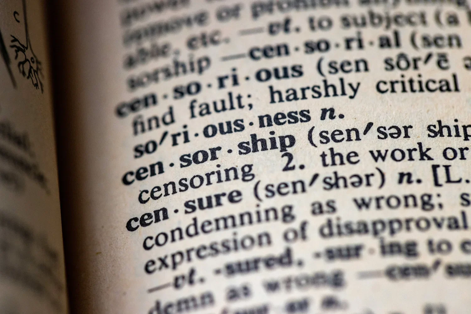 a close up of a dictionary page of the word censorship