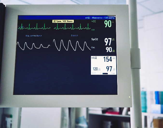 A TV with a patient's medical information on the screen.