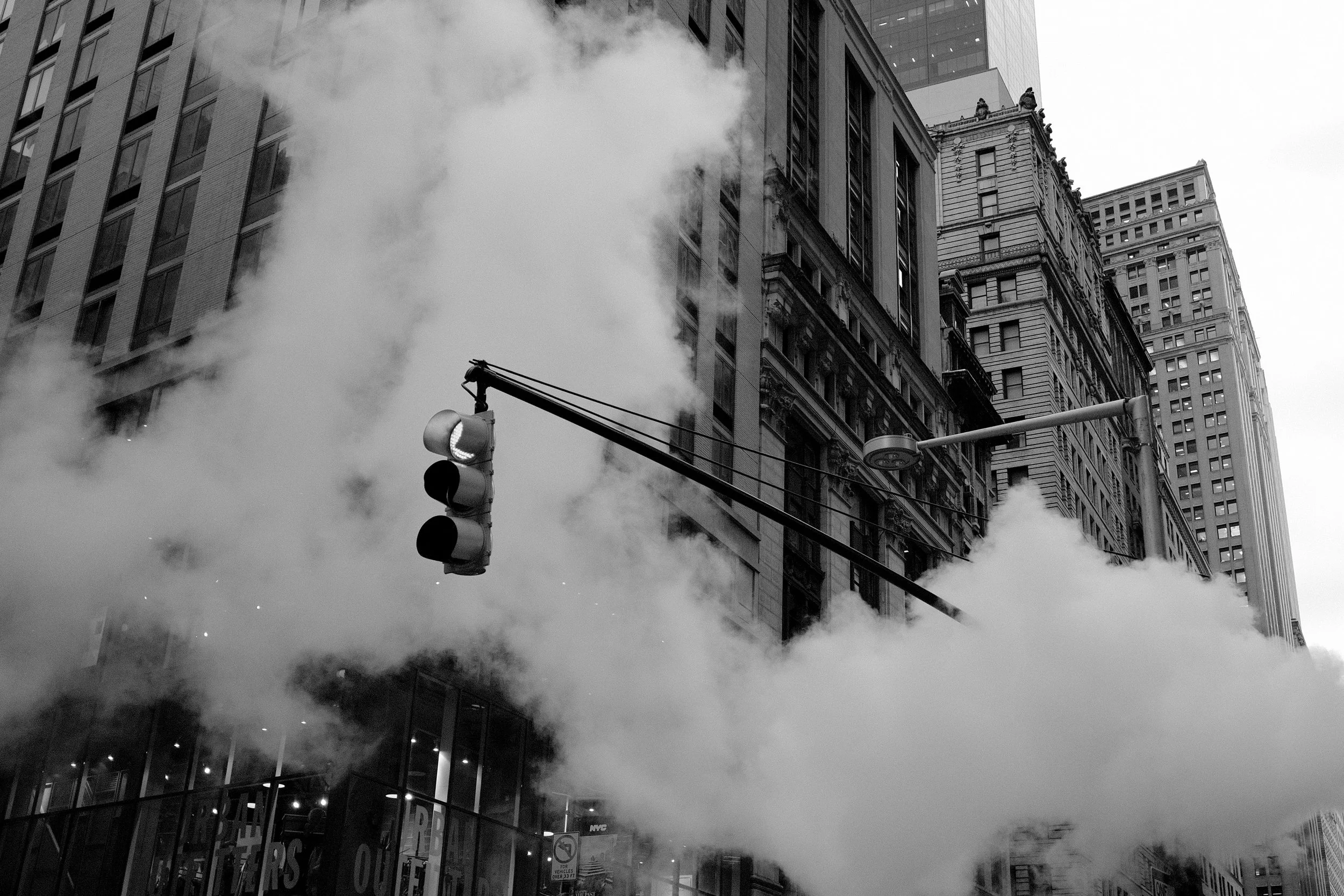 A street light amidst fog in New York City