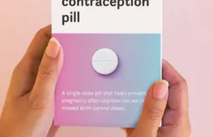 A pair of hands holding an emergency contraception pill box