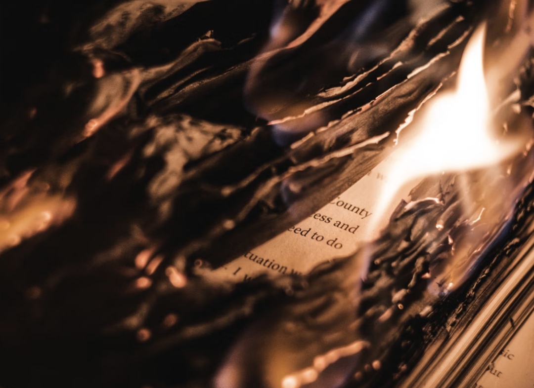 A photo of pages on fire