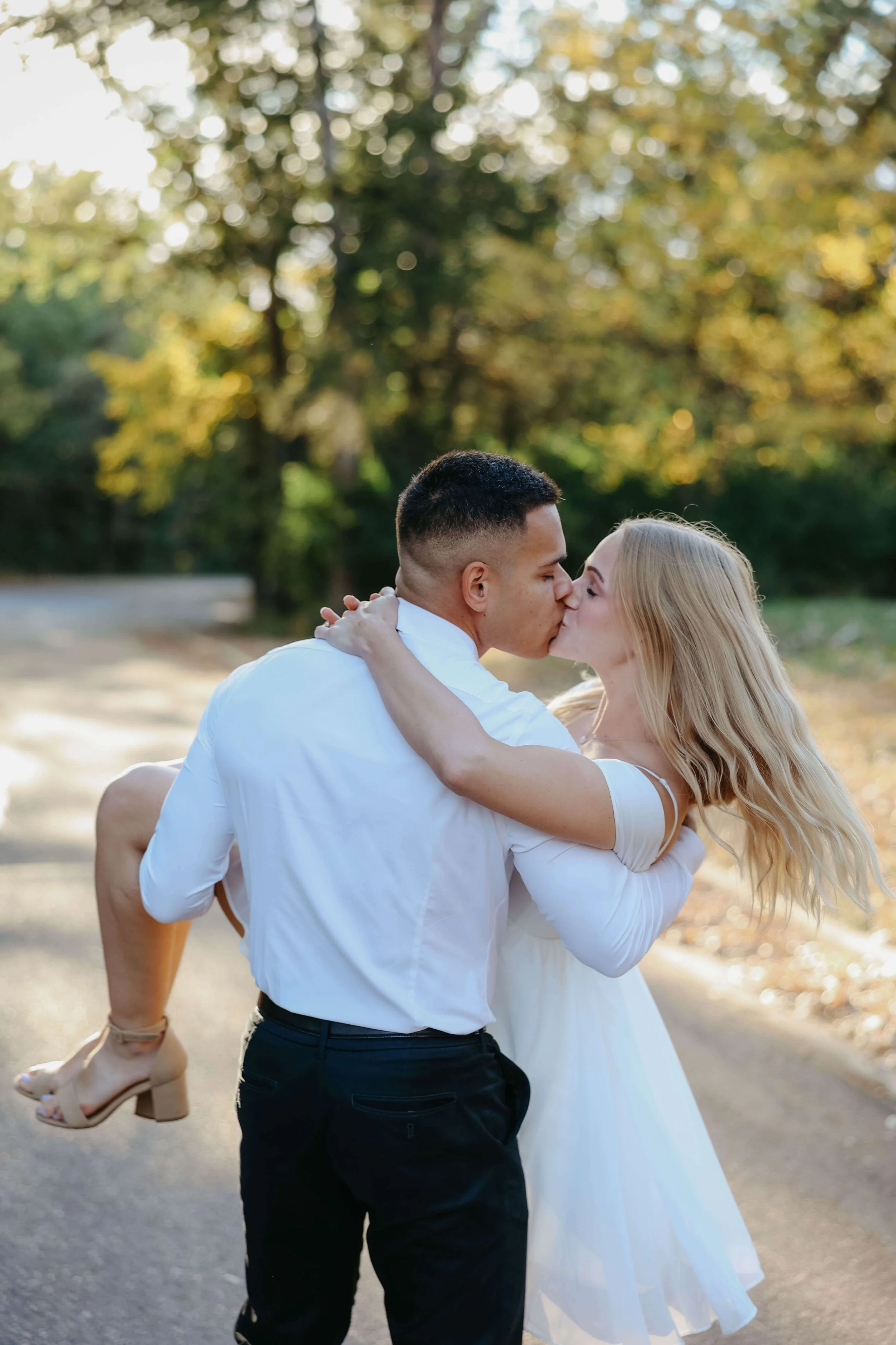 Engaged couple dancing at their engagement session in Sioux Falls.