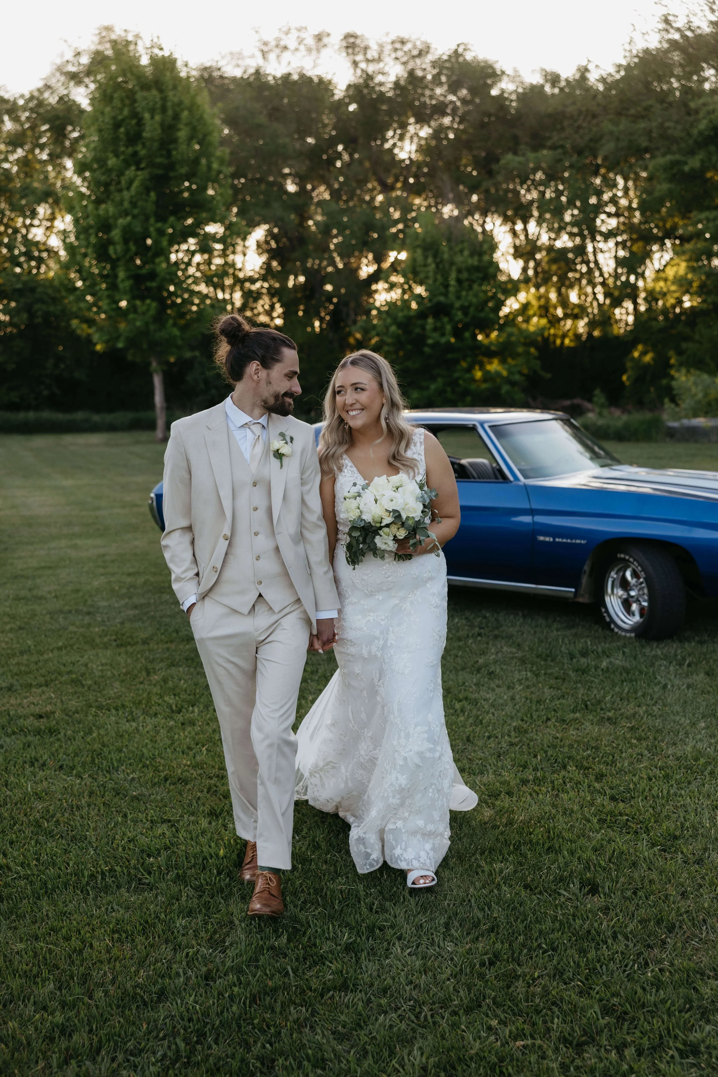 Bride and groom doing sunset portraits at the Canton Barn in Canton South Dakota, photographed by Jenna Heckel Photography. 