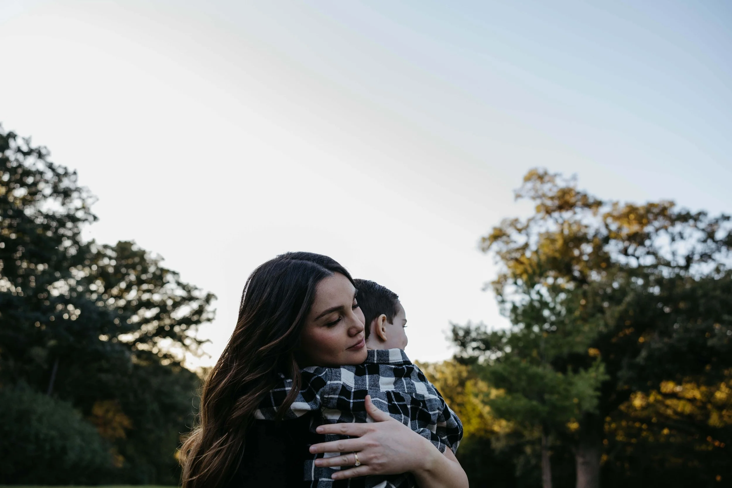 A mother and son during their family photo shoot at tuthill park in Sioux Falls. Photos taken by Jenna Heckel Photography.