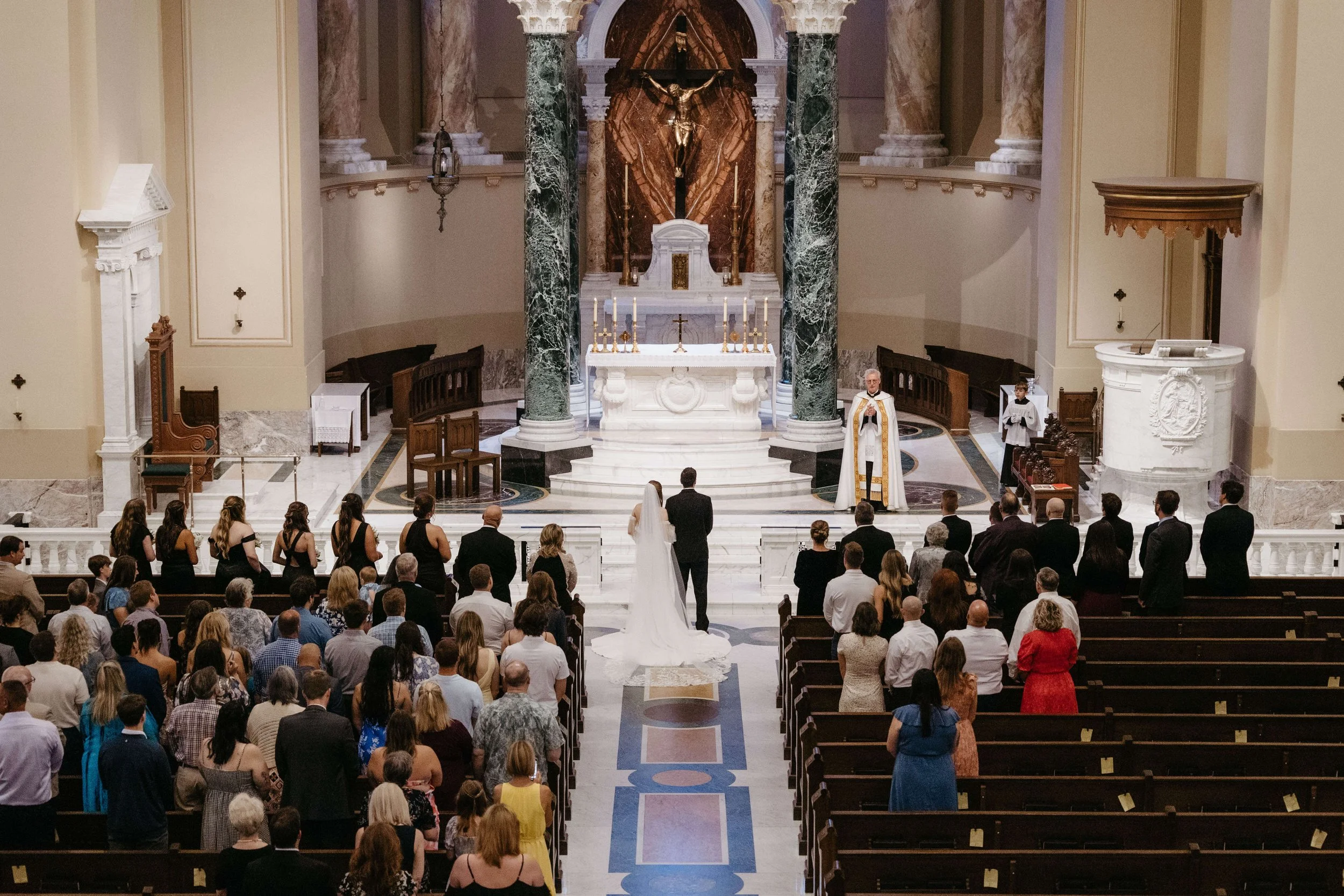 Couple during their Ceremony at historic St. Josephs Cathedral in downtown Sioux Falls.