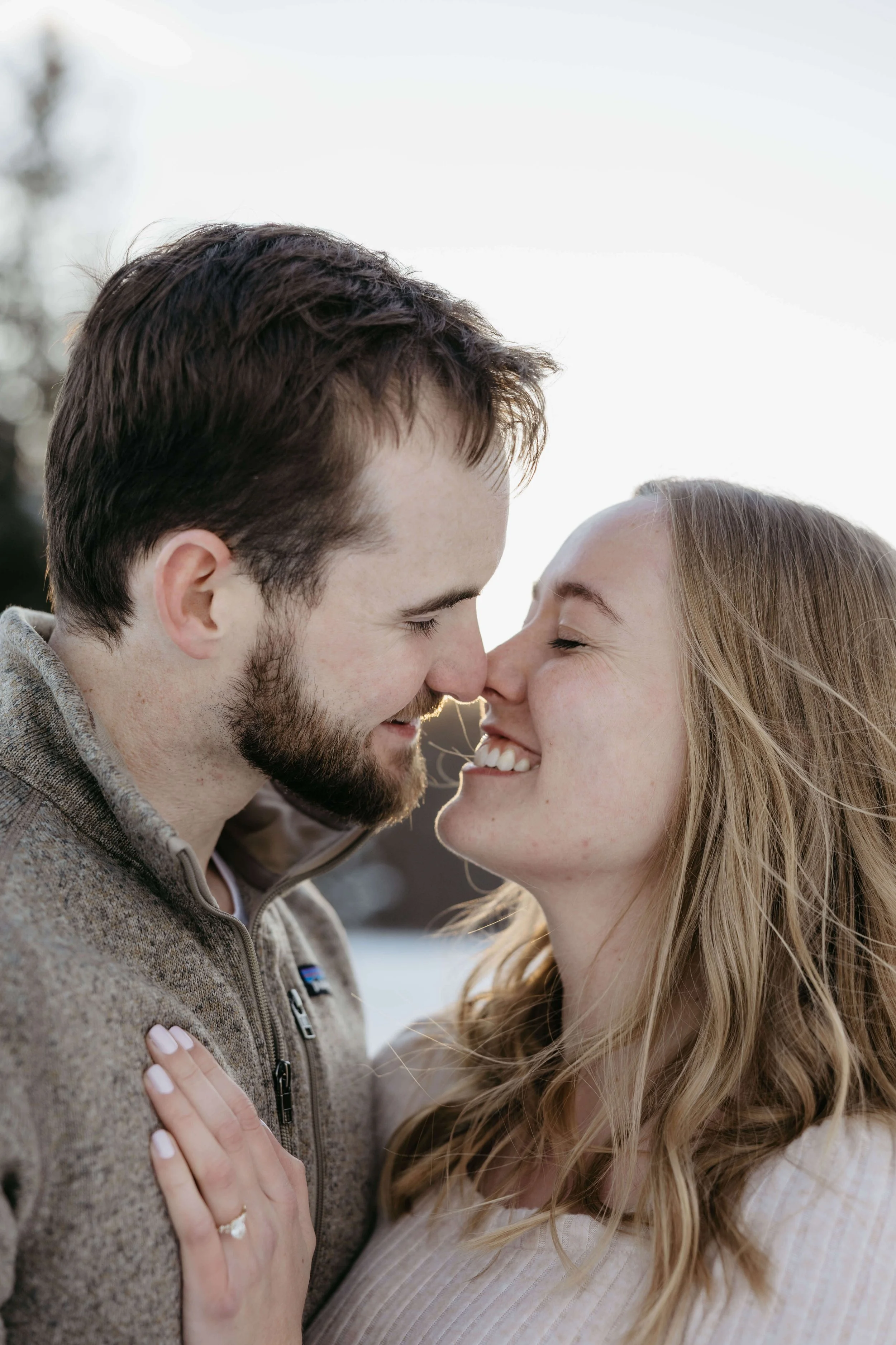 Winter engagement session in Sioux Falls at the outdoor campus with Jenna Heckel Photography.