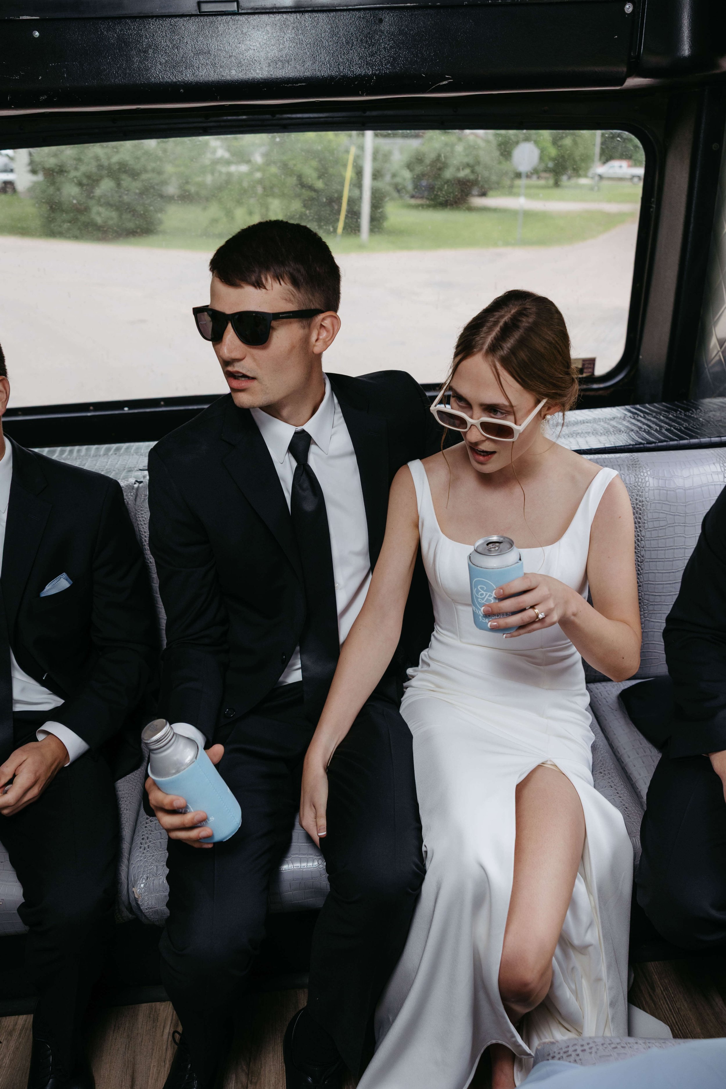 Fun wedding party photos by the river in Yankton South Dakota.