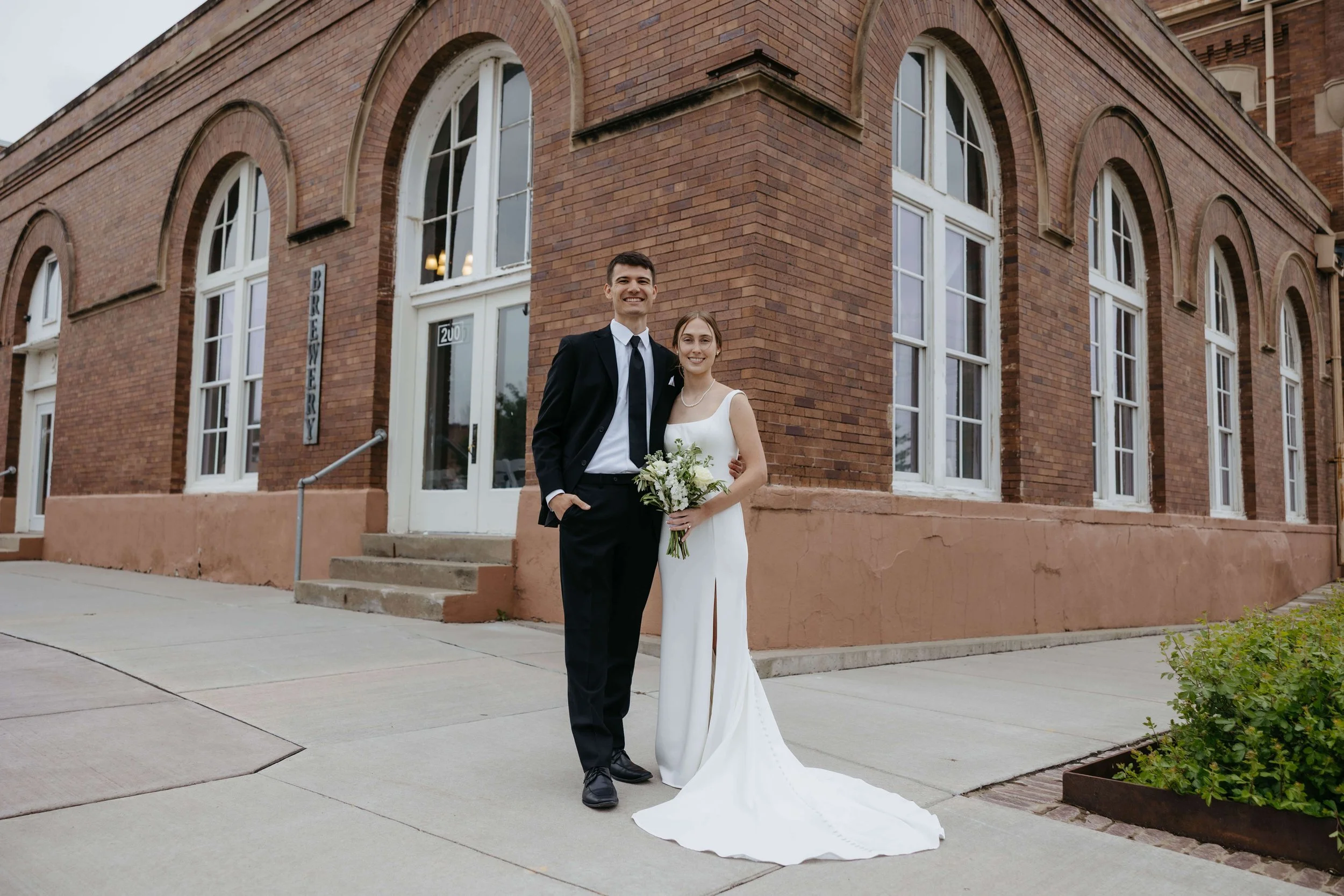 Couple doing portraits on their wedding day in Yankton South Dakota photographed by Jenna Heckel Photography