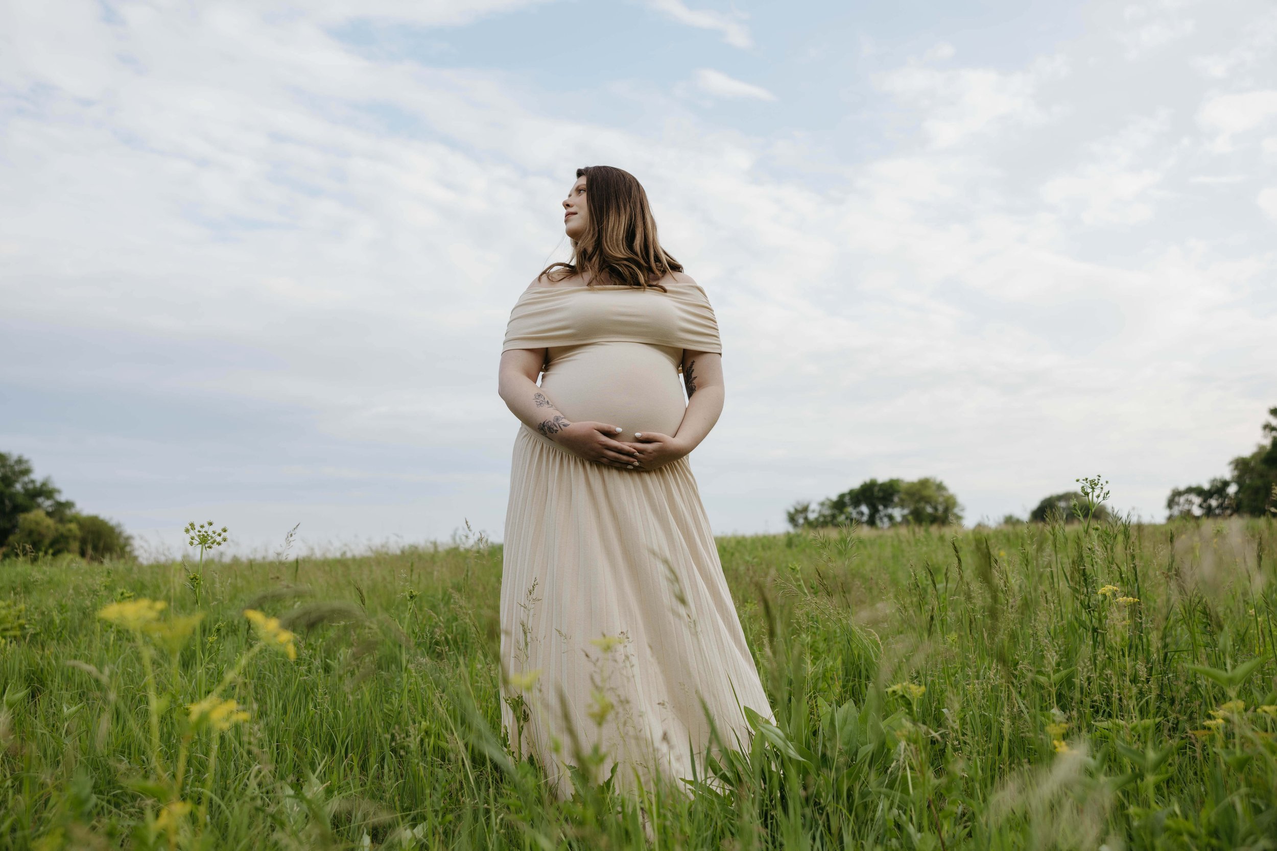 A pregnant belly during a maternity photography session in Sioux Falls