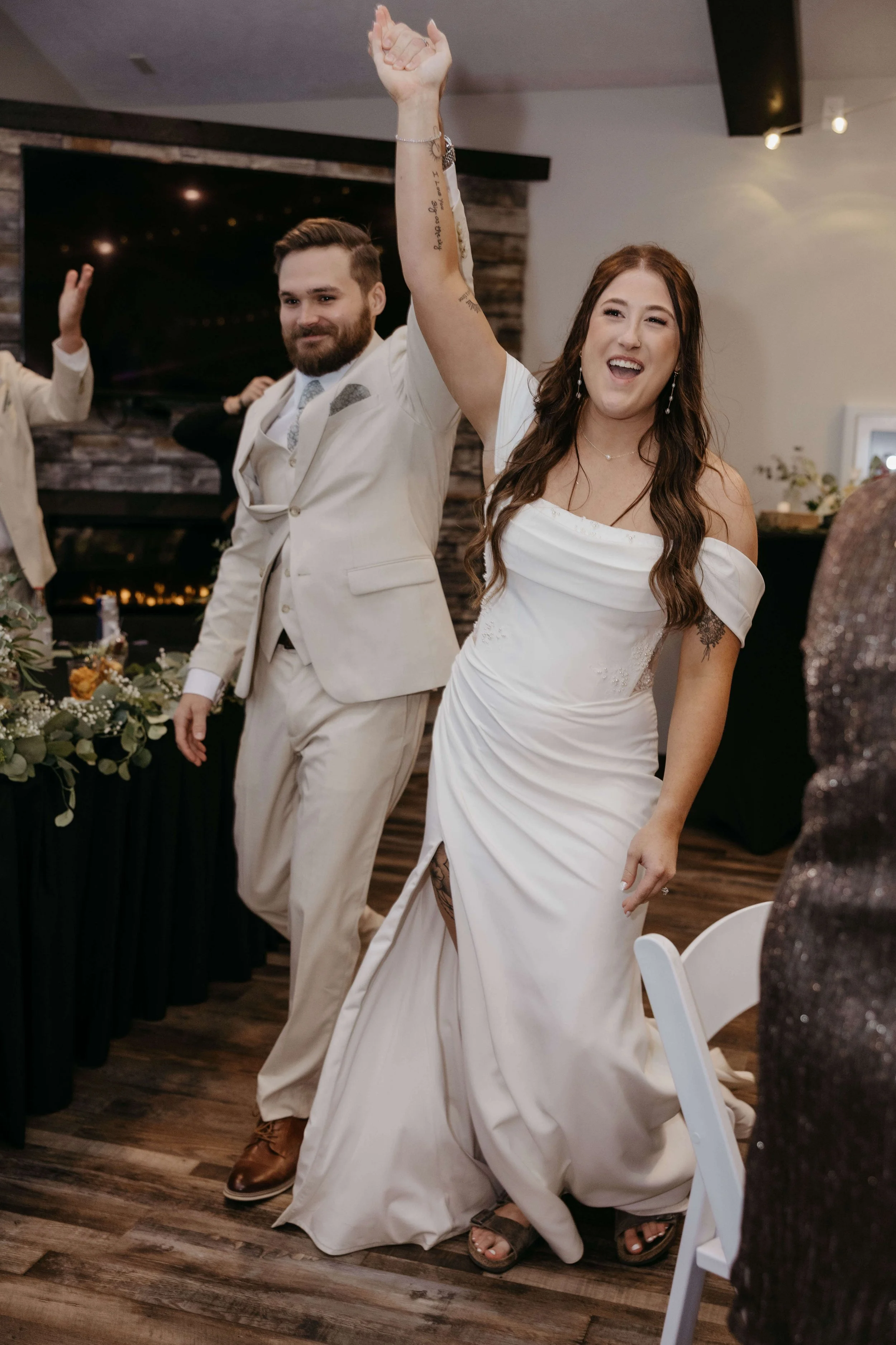 Bride and groom during their reception at Granite Springs Lodge near Mitchell South Dakota photographed by Jenna Heckel Photography.