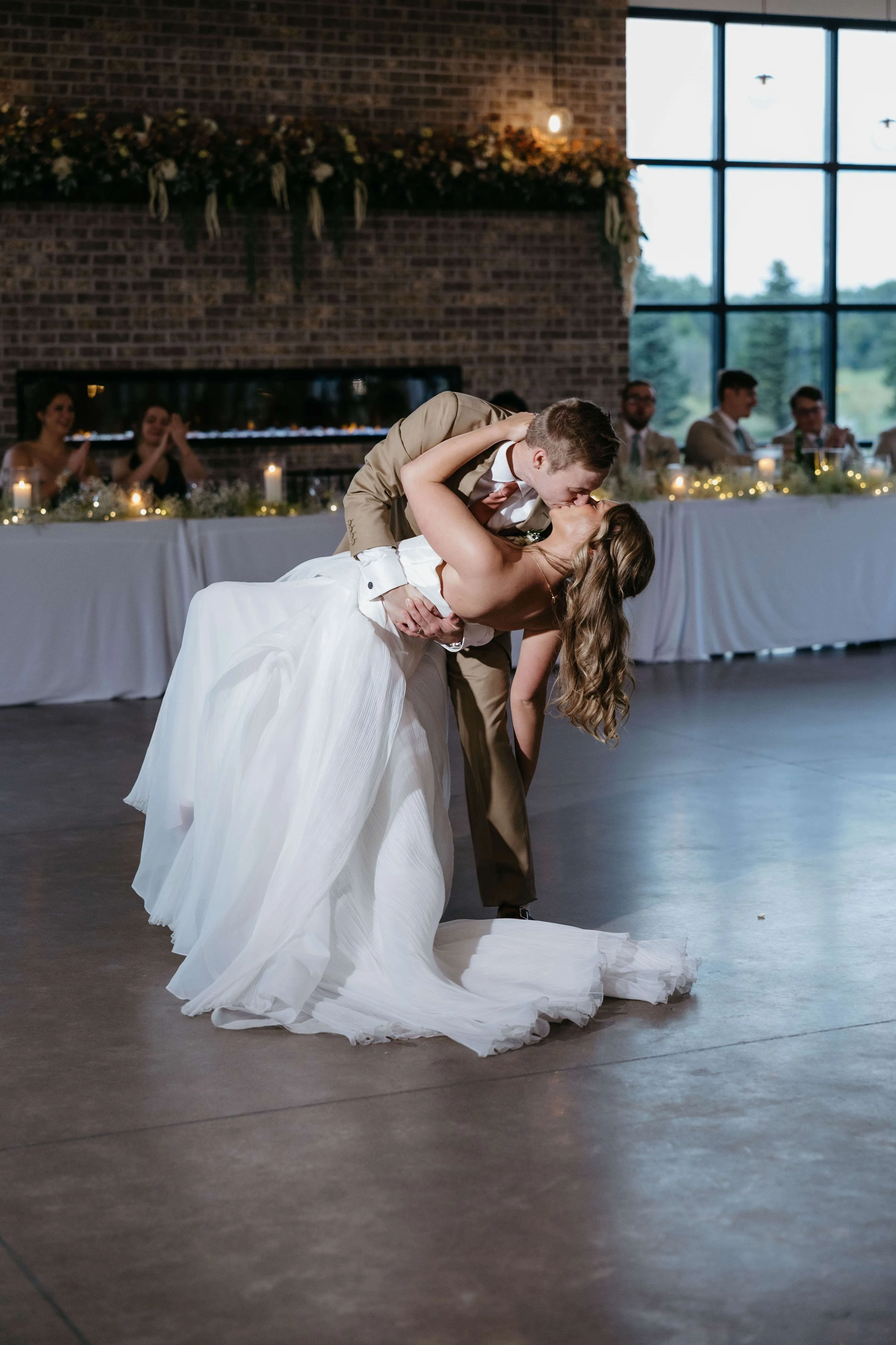 Bride and groom doing first dance at The Atrium in Sioux Falls SD photographed by Jenna Heckel Photography.