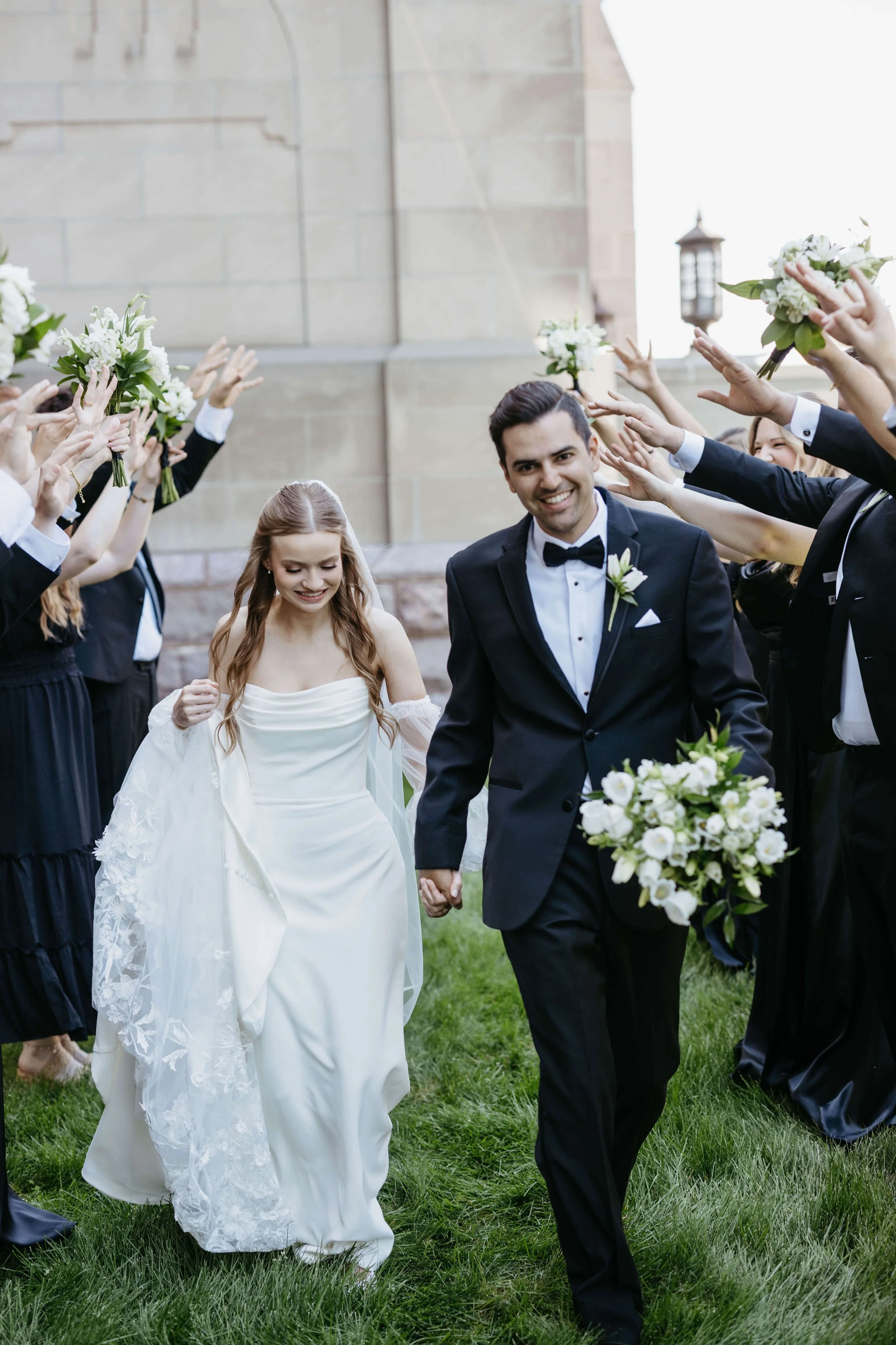 Couple on their wedding day at St. Josephs Cathedral in historic district of downtown Sioux Falls.