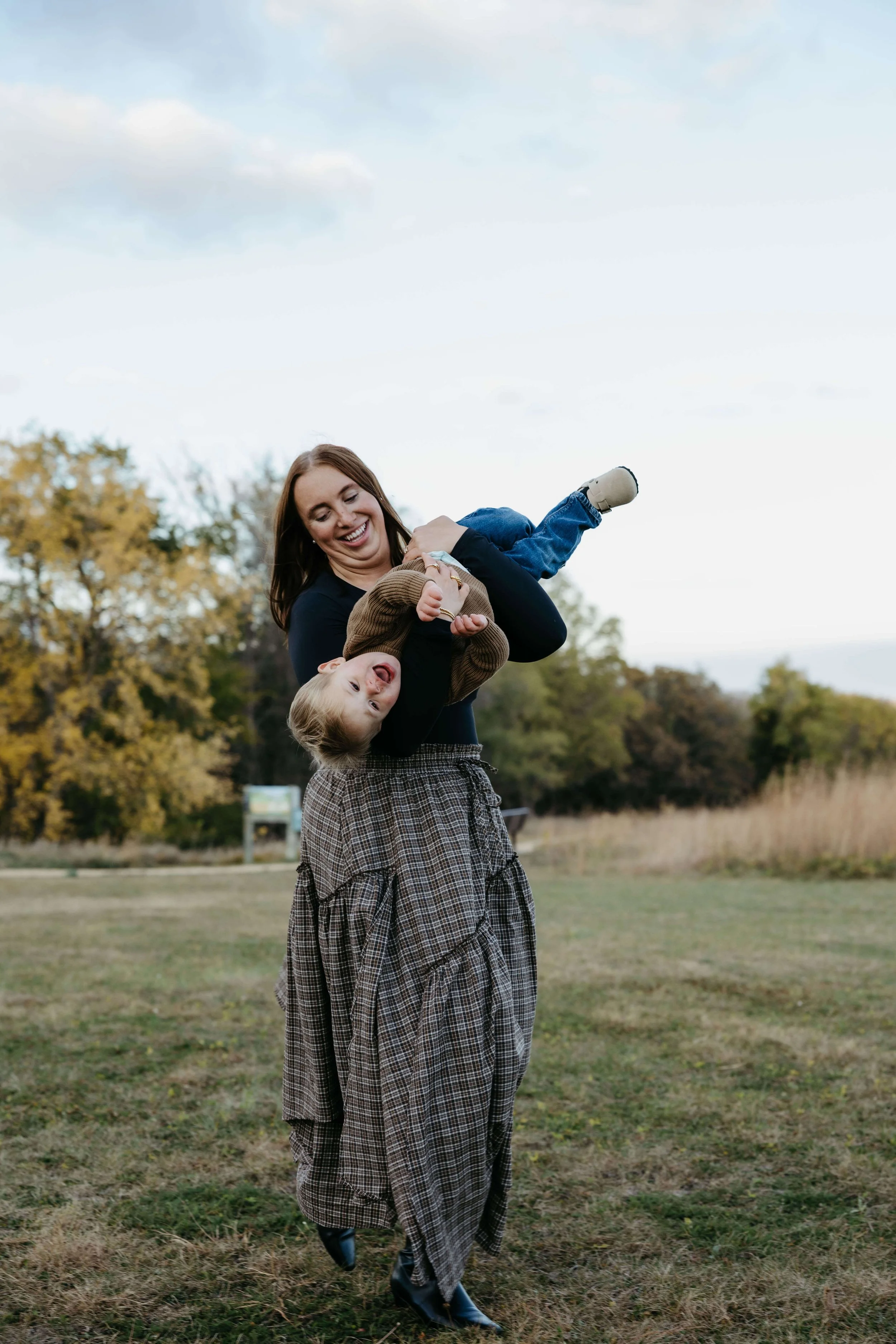 Fall family photo shoot at Good Earth State Park. Photographed by Jenna Heckel Photography.