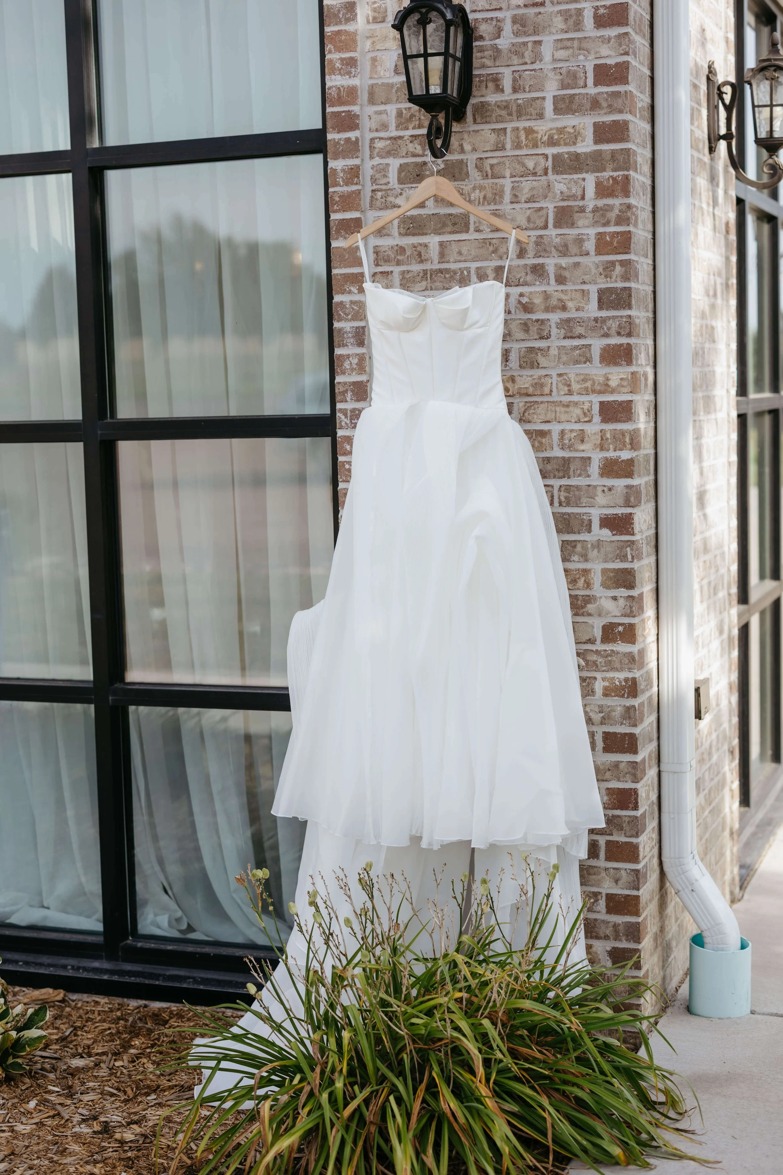 Photo of bride dress at the atrium in Sioux Falls photographed by Jenna Heckel photography.