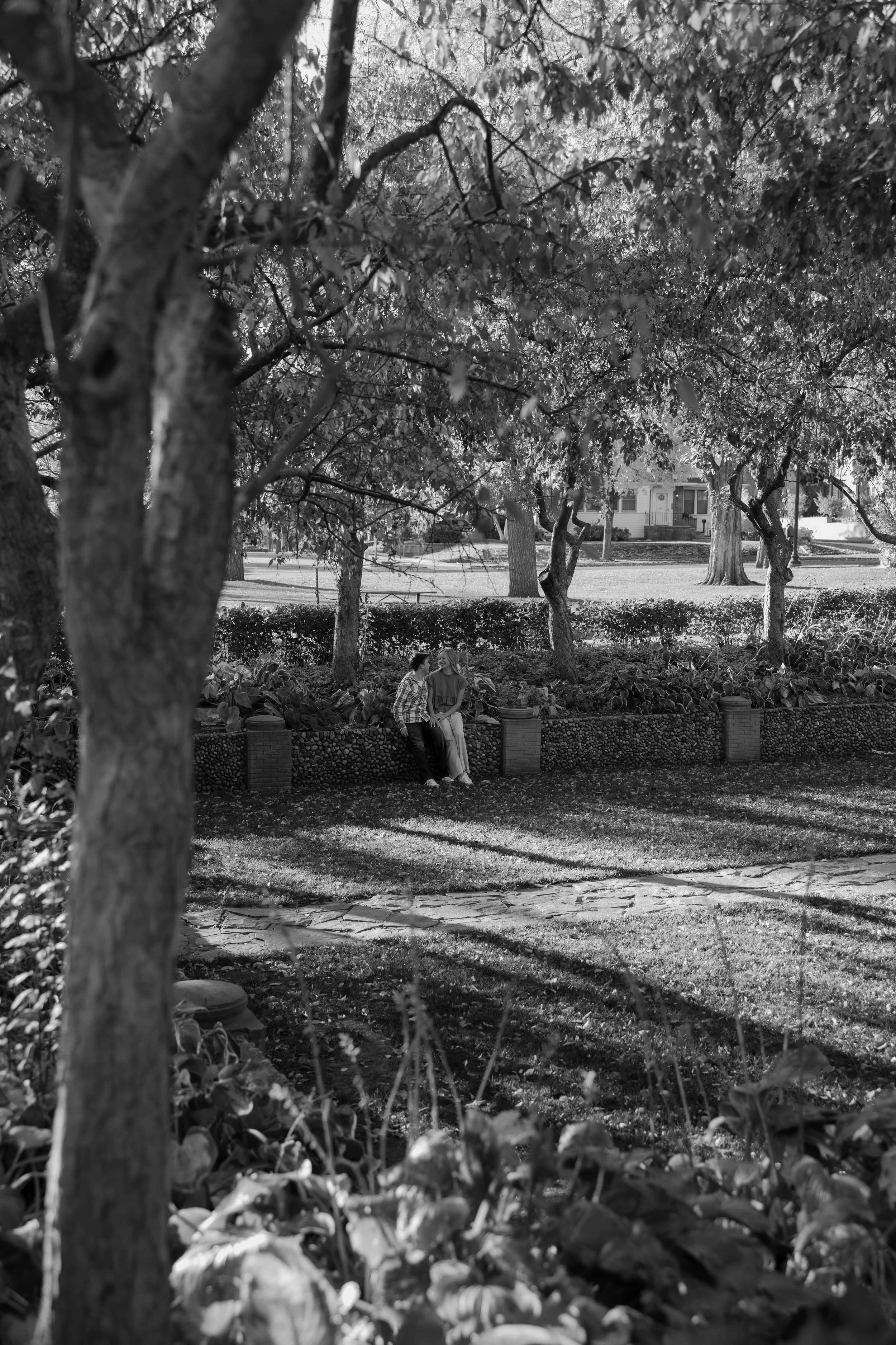 Couple doing fall engagement photos at McKennan park in Sioux Falls with Jenna Heckel Photography.