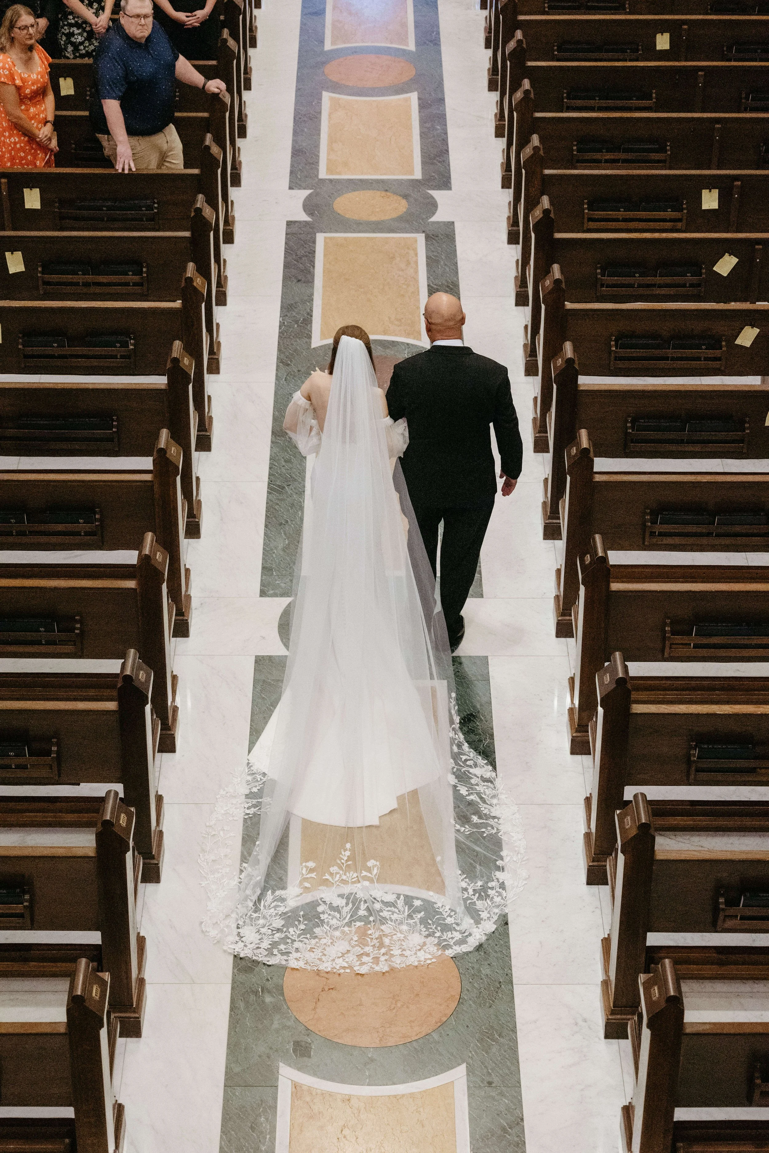 Couple during their Ceremony at historic St. Josephs Cathedral in downtown Sioux Falls.