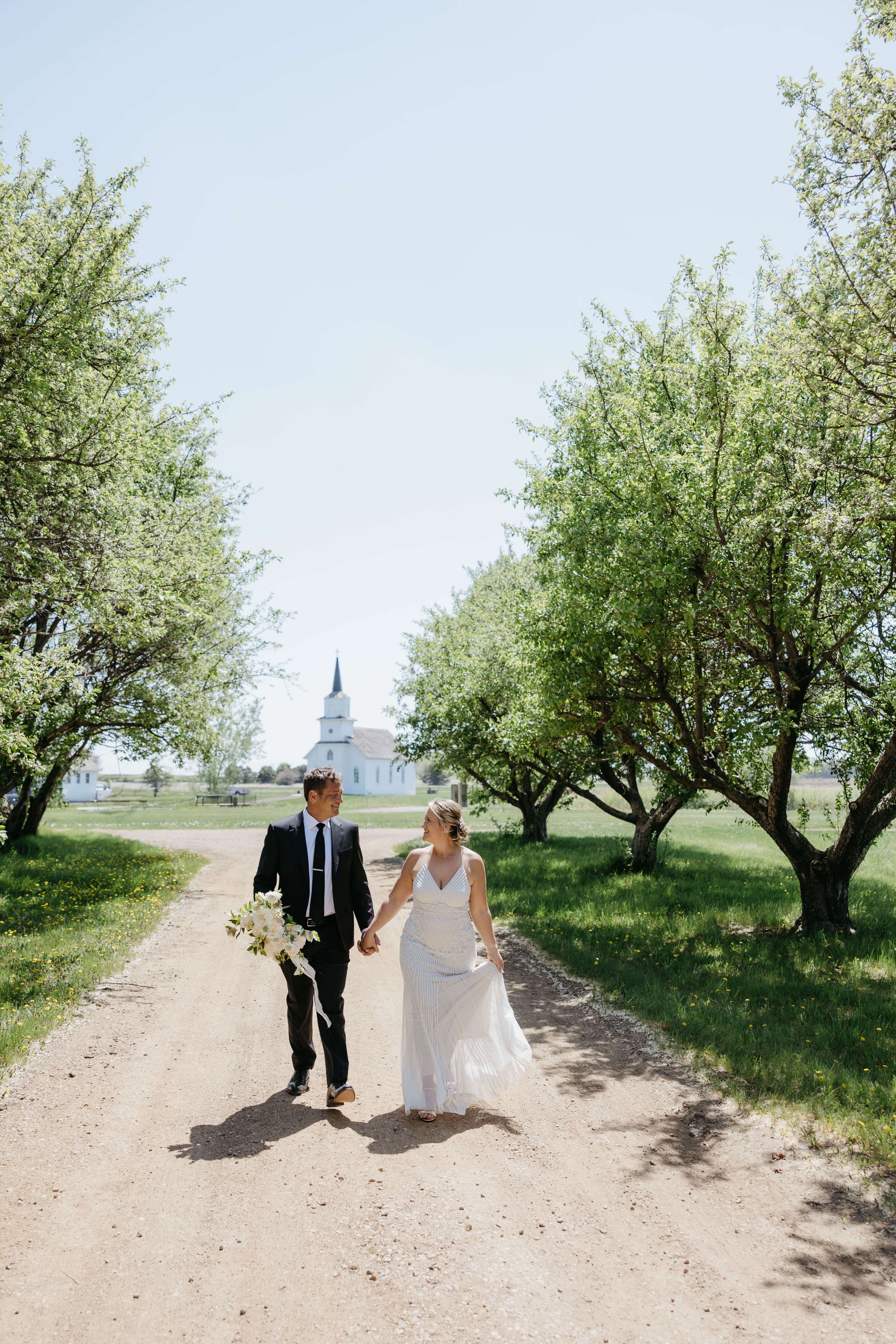 Bride and groom at their micro wedding at the Beaver Creek Chapel in Harrisburg South Dakota.
