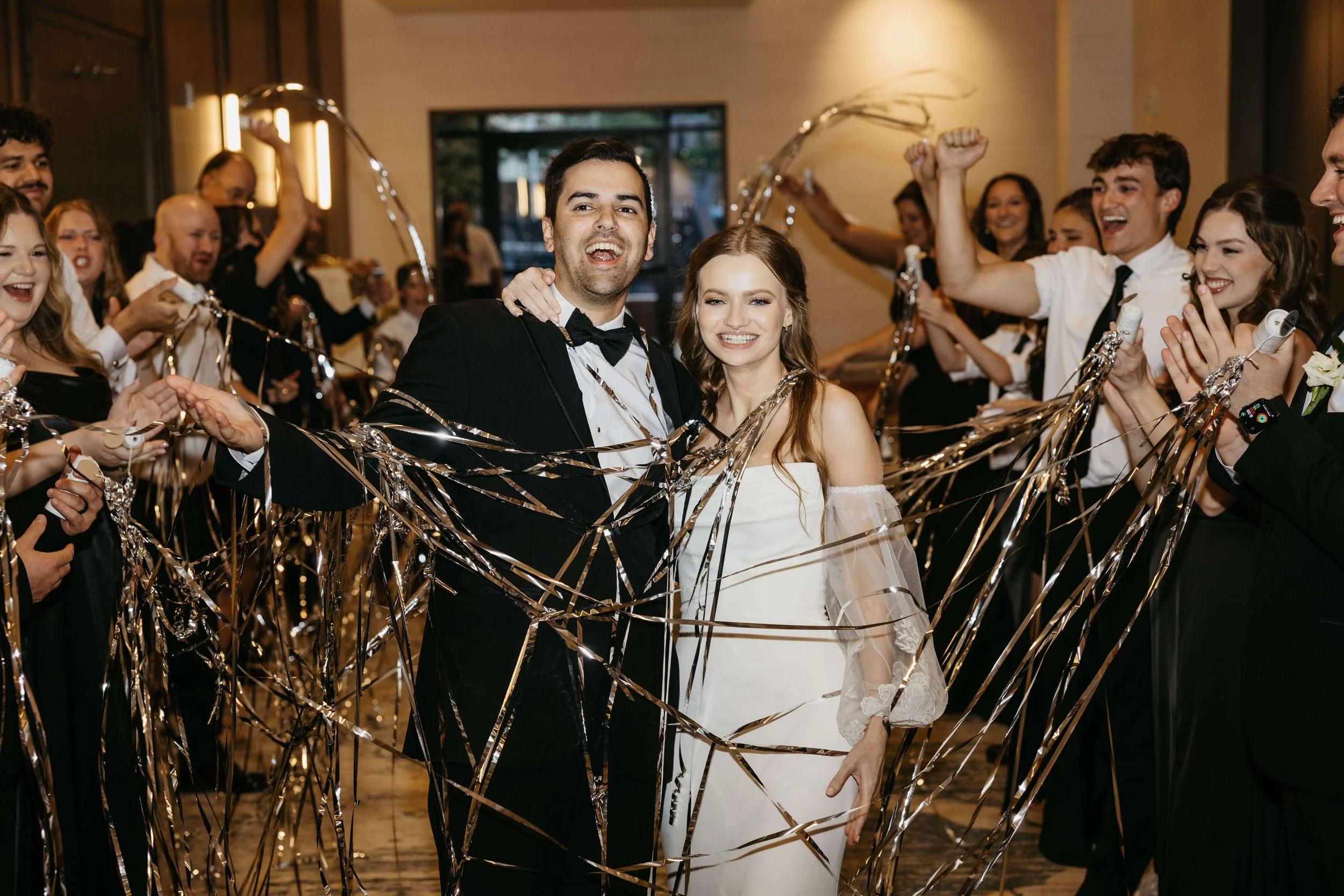 Couple dancing during their reception at downtown hotel to a live band. Photos taken by Jenna Heckel photography.