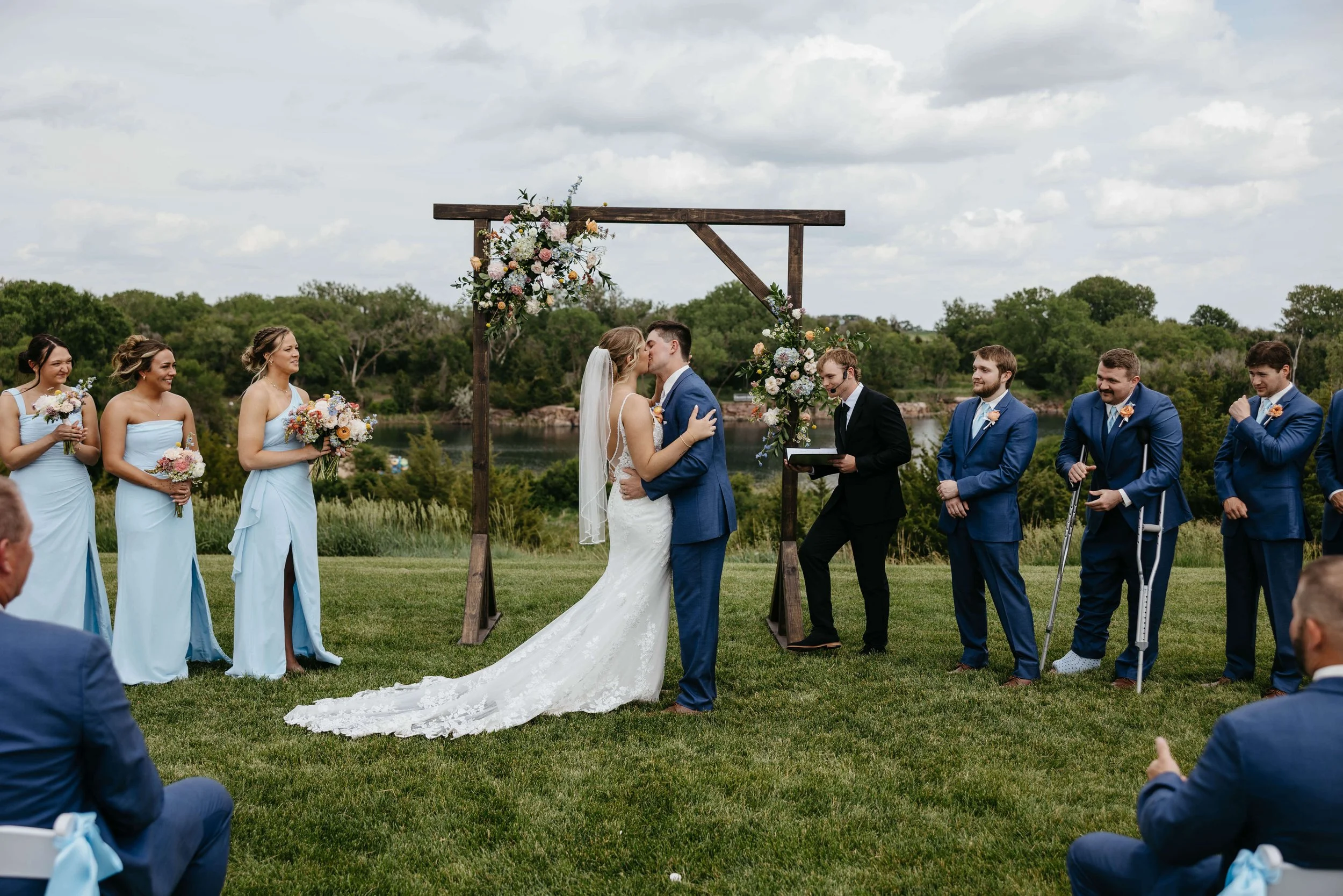 Couple sharing their first kiss at Granite Springs Lodge near Mitchell SD.